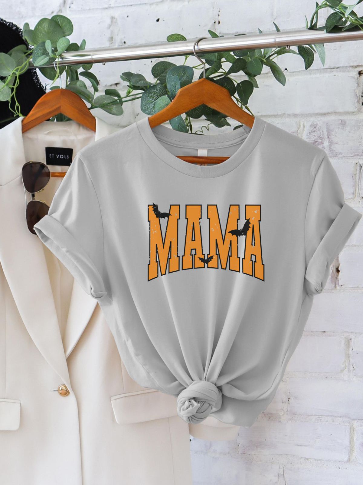 Mama design women's Halloween t-shirt on hanger