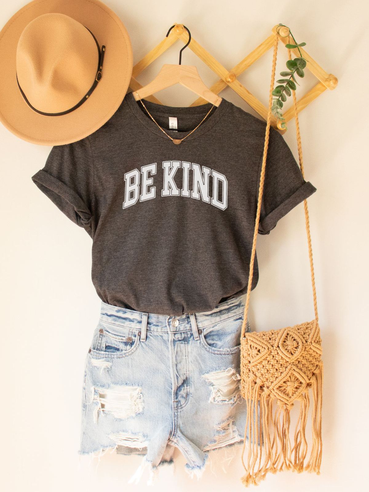 Be Kind unisex t-shirt with denim shorts and hat