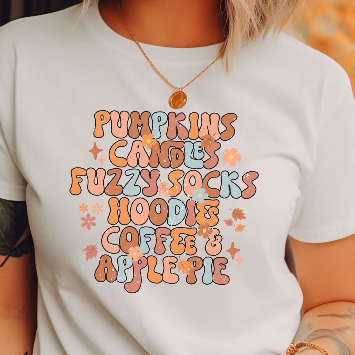 woman wearing autumn themed t-shirt with text design