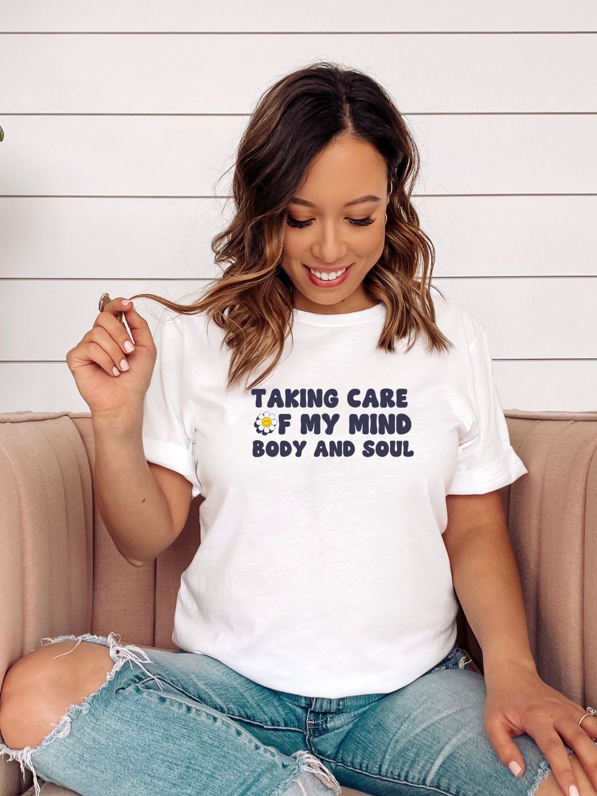 woman wearing Taking Care of My Mind Body and Soul t-shirt