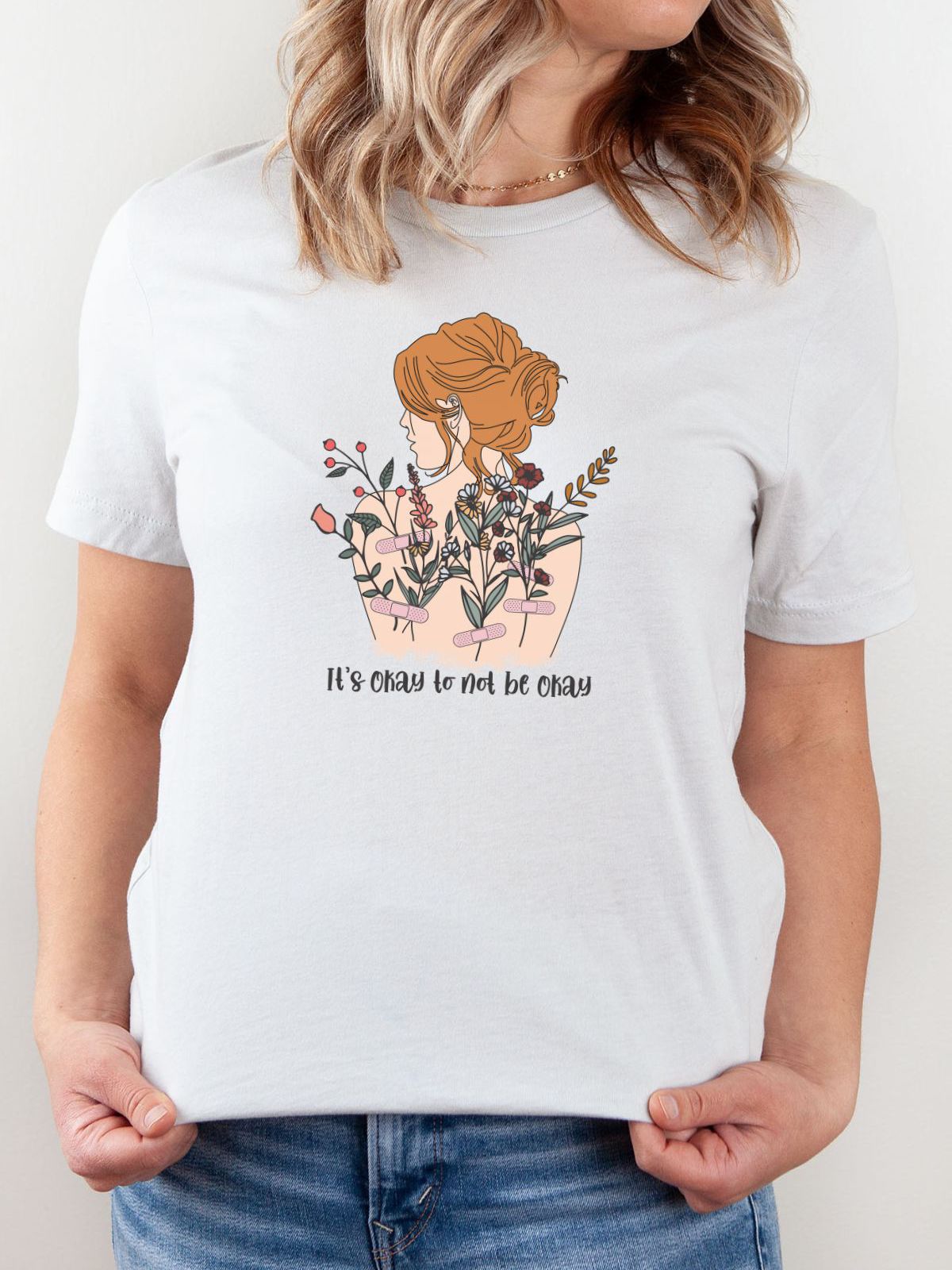 woman wearing t-shirt with floral woman design