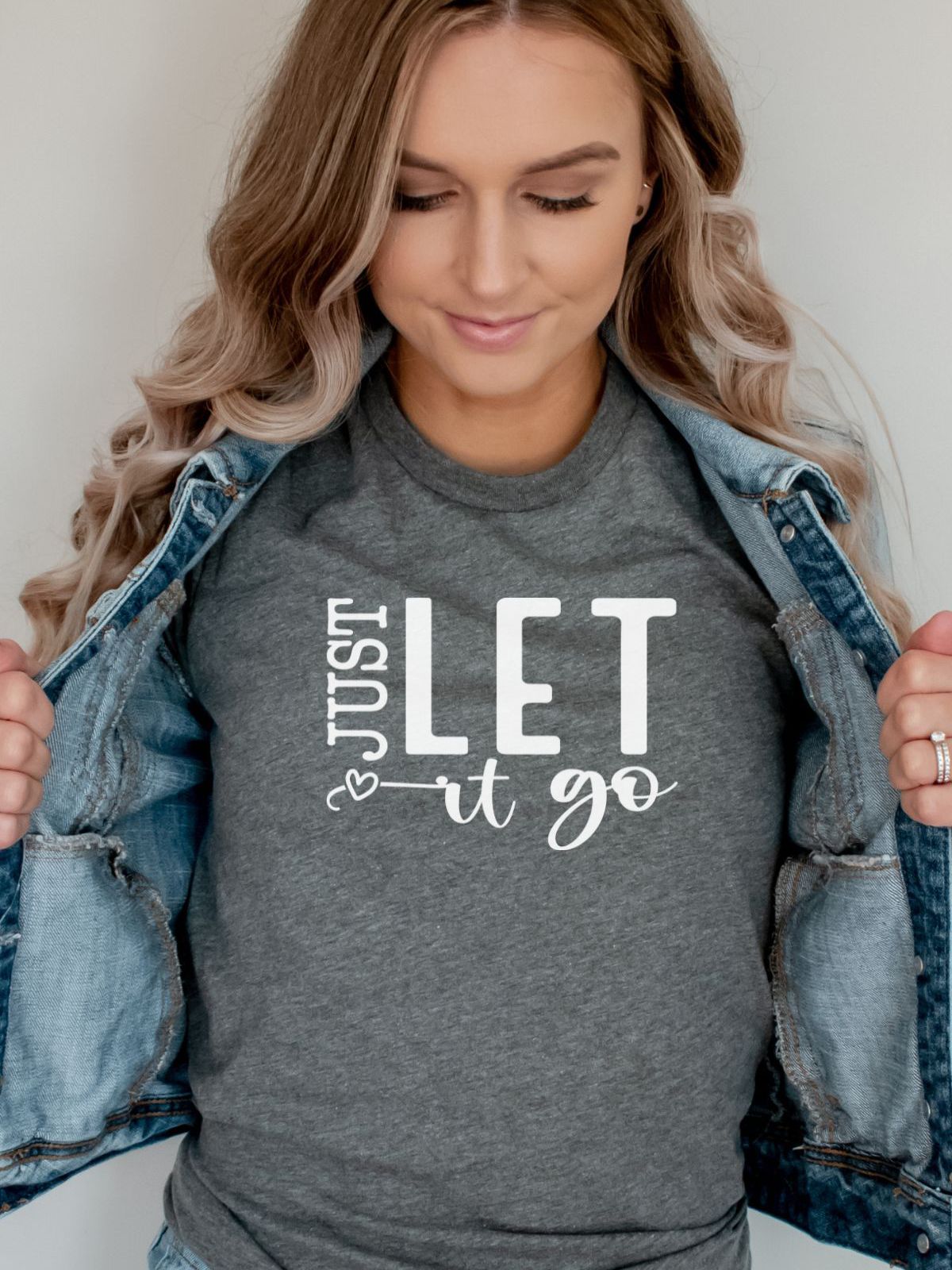 woman wearing Just Let It Go grey t-shirt