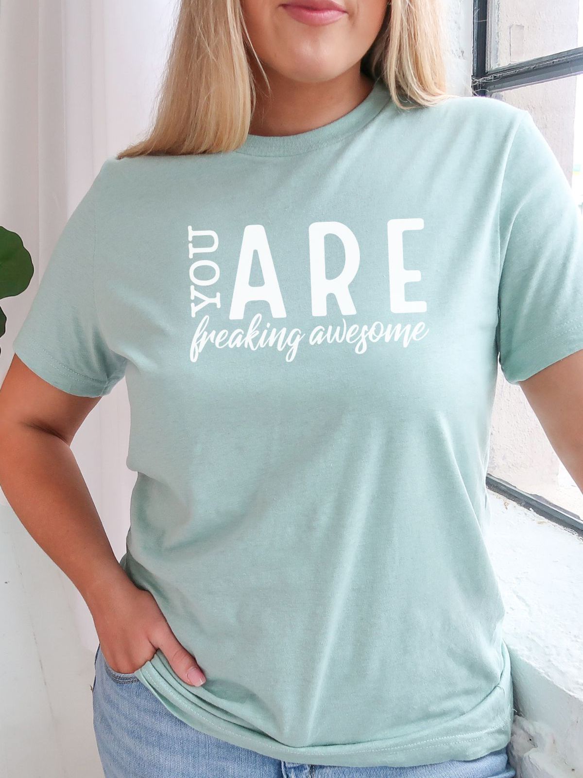 Womens green t-shirt with You Are Freaking Awesome text