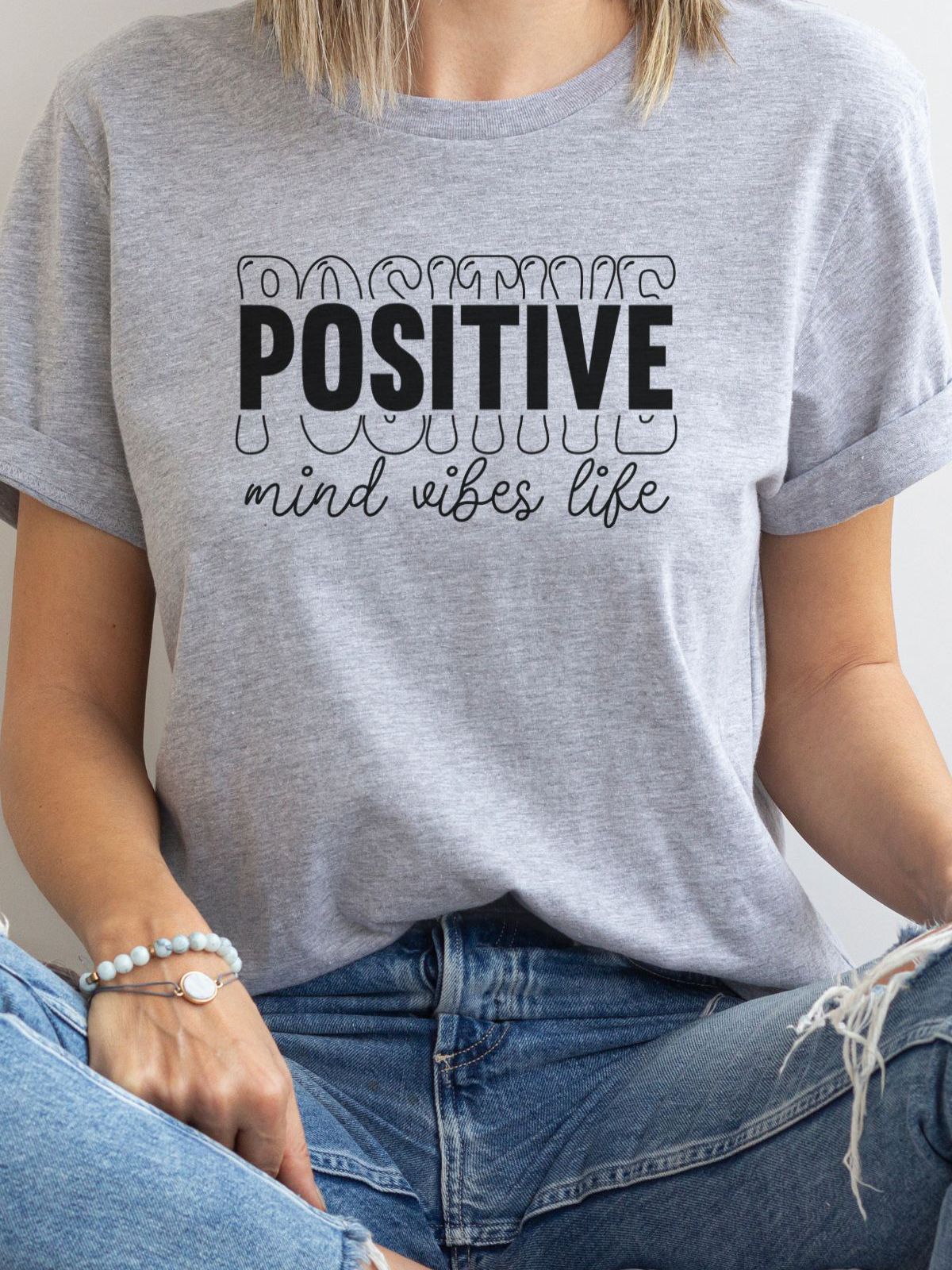 Women's grey t-shirt with positive message