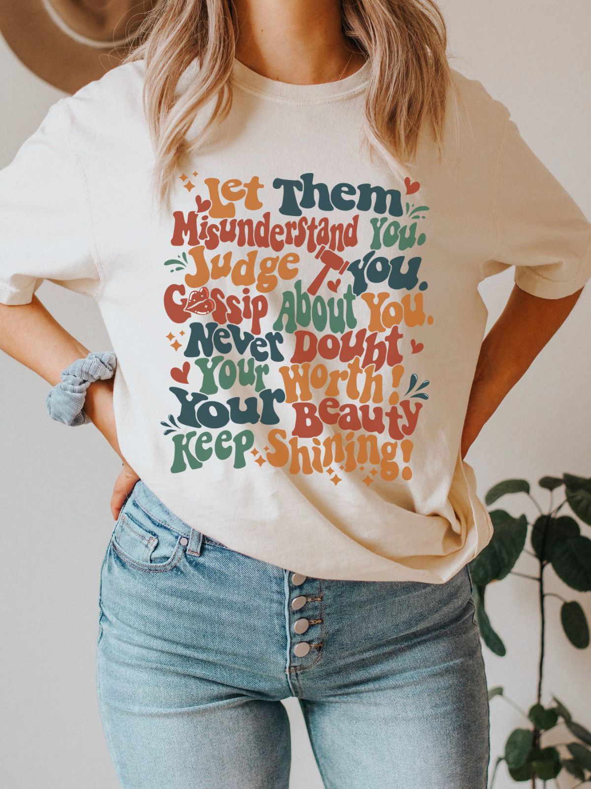 Woman wearing a motivational t-shirt with colorful quote
