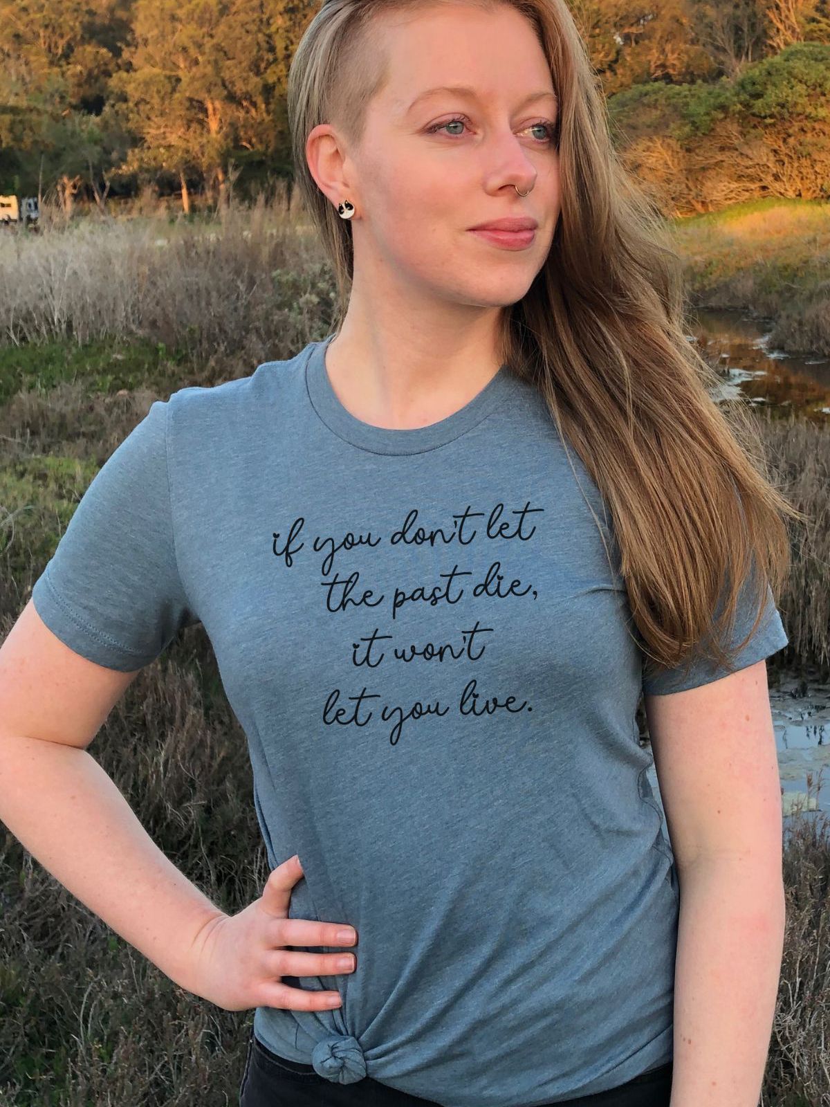 Women's t-shirt with inspirational quote outdoors
