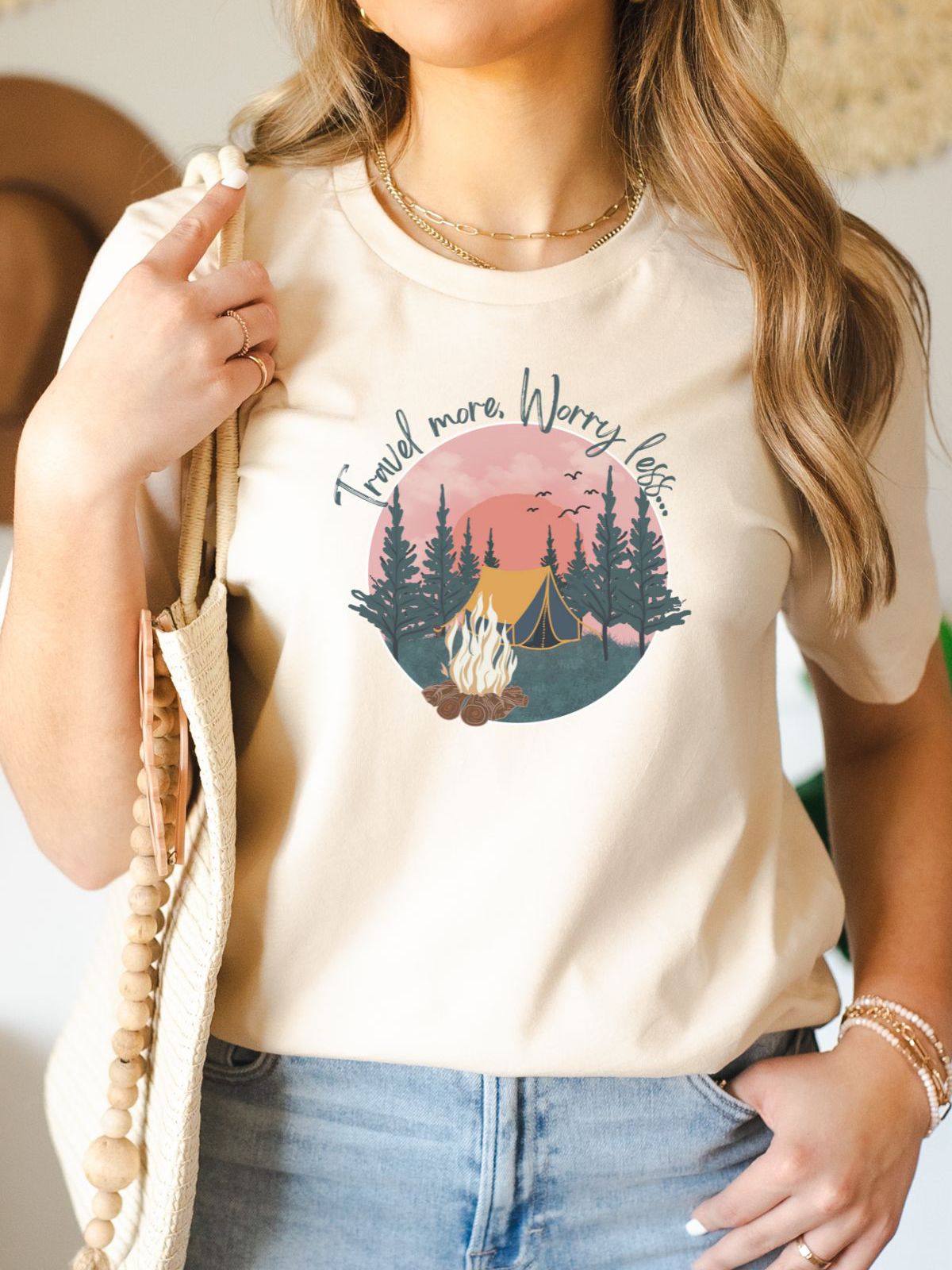 woman wearing travel more worry less camping t-shirt