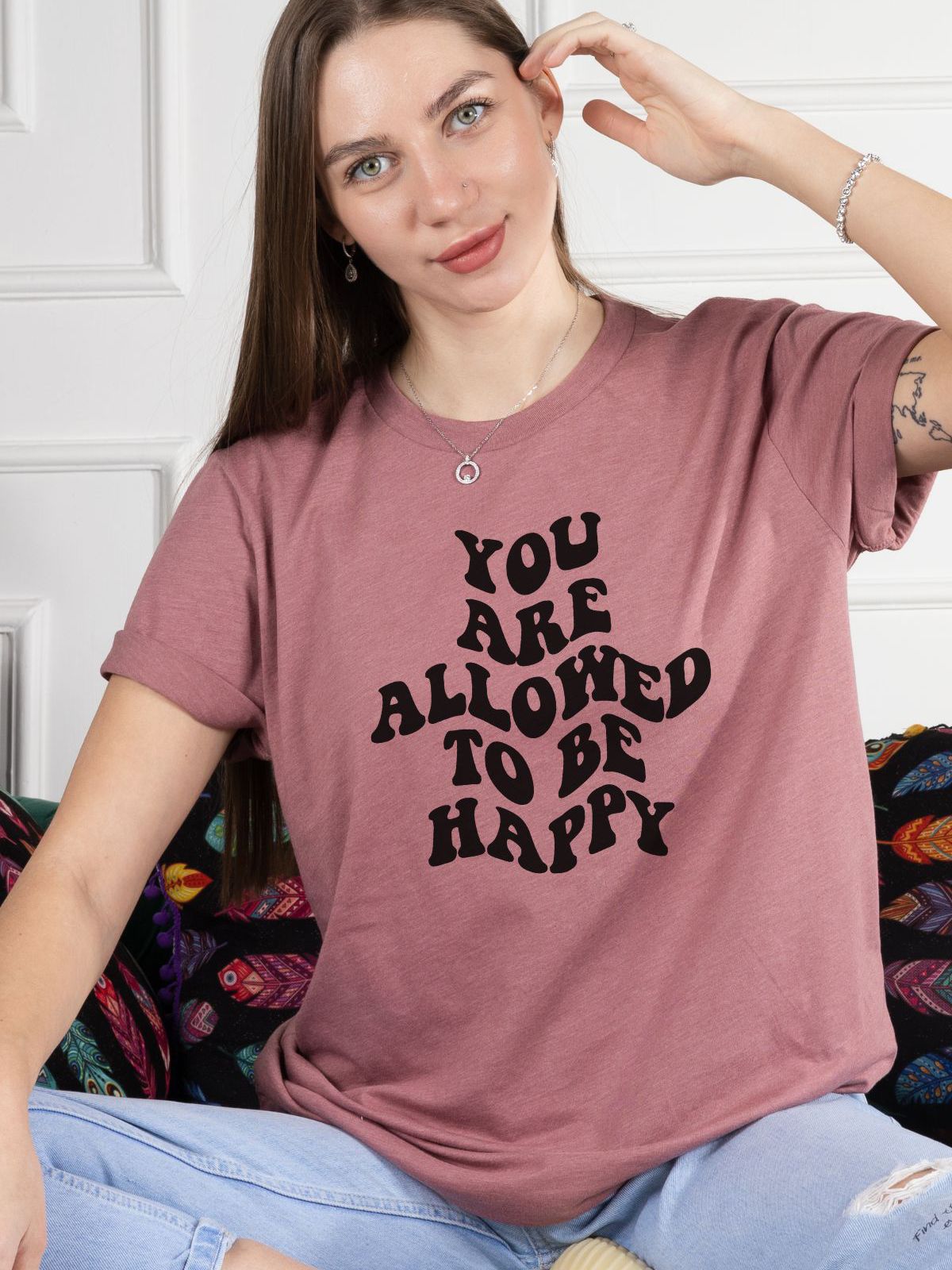 Woman wearing You Are Allowed to Be Happy shirt