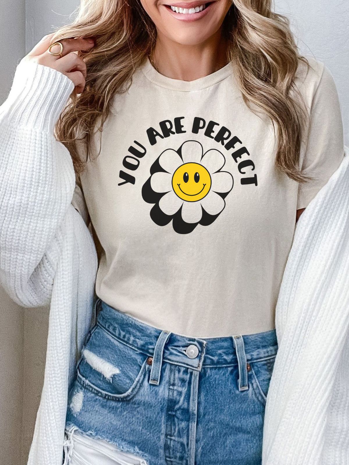 Woman wearing a t-shirt with You Are Perfect design