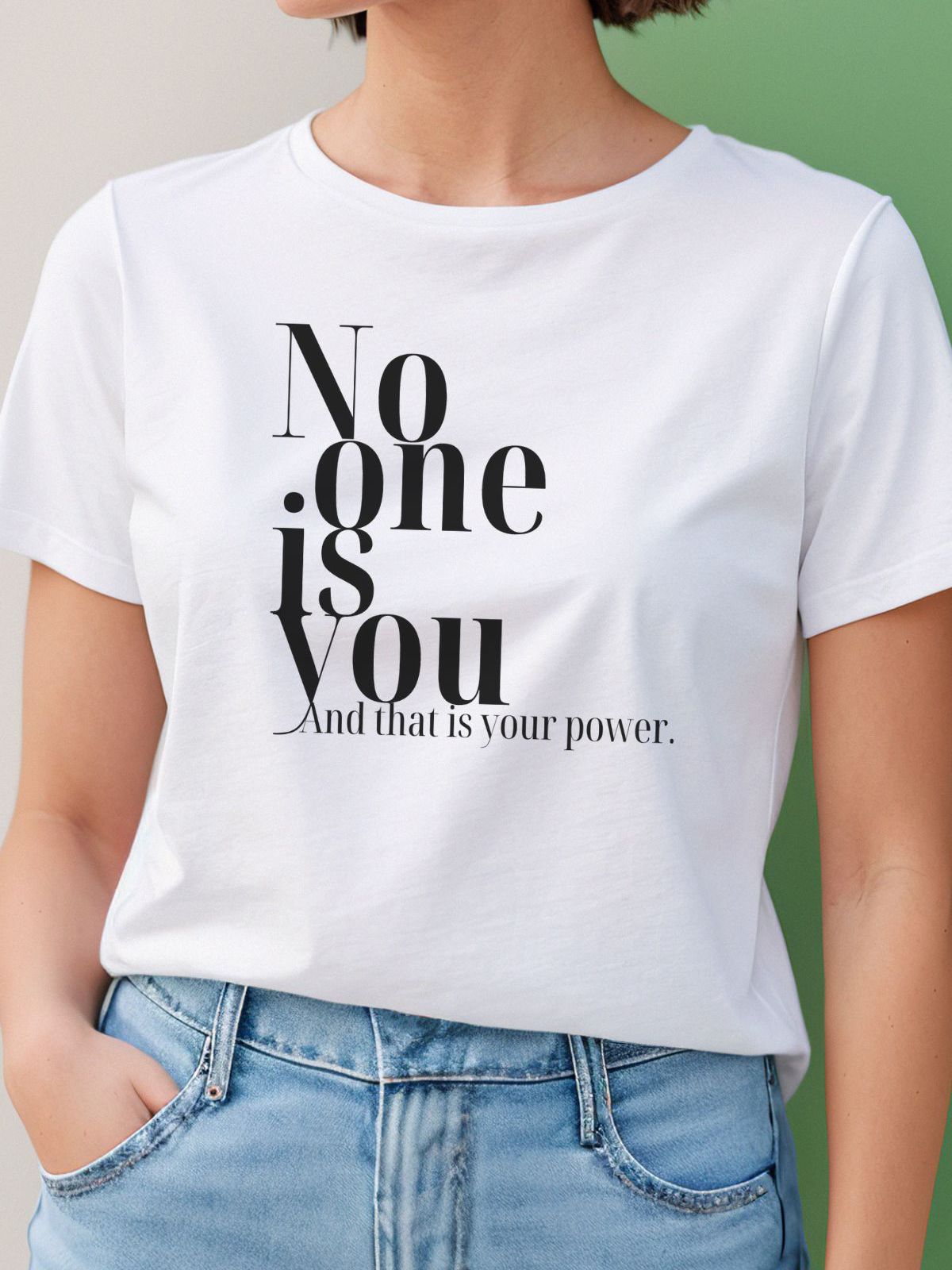 white t-shirt with quote No one is you and that is your power