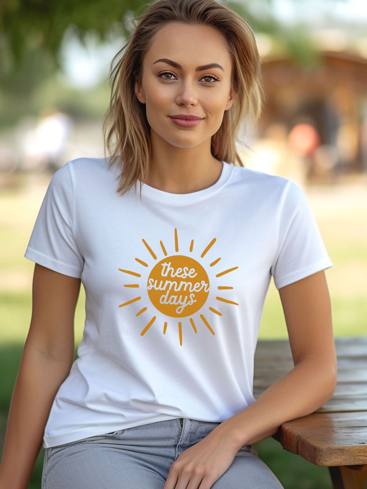 woman wearing a white t-shirt with these summer days graphic