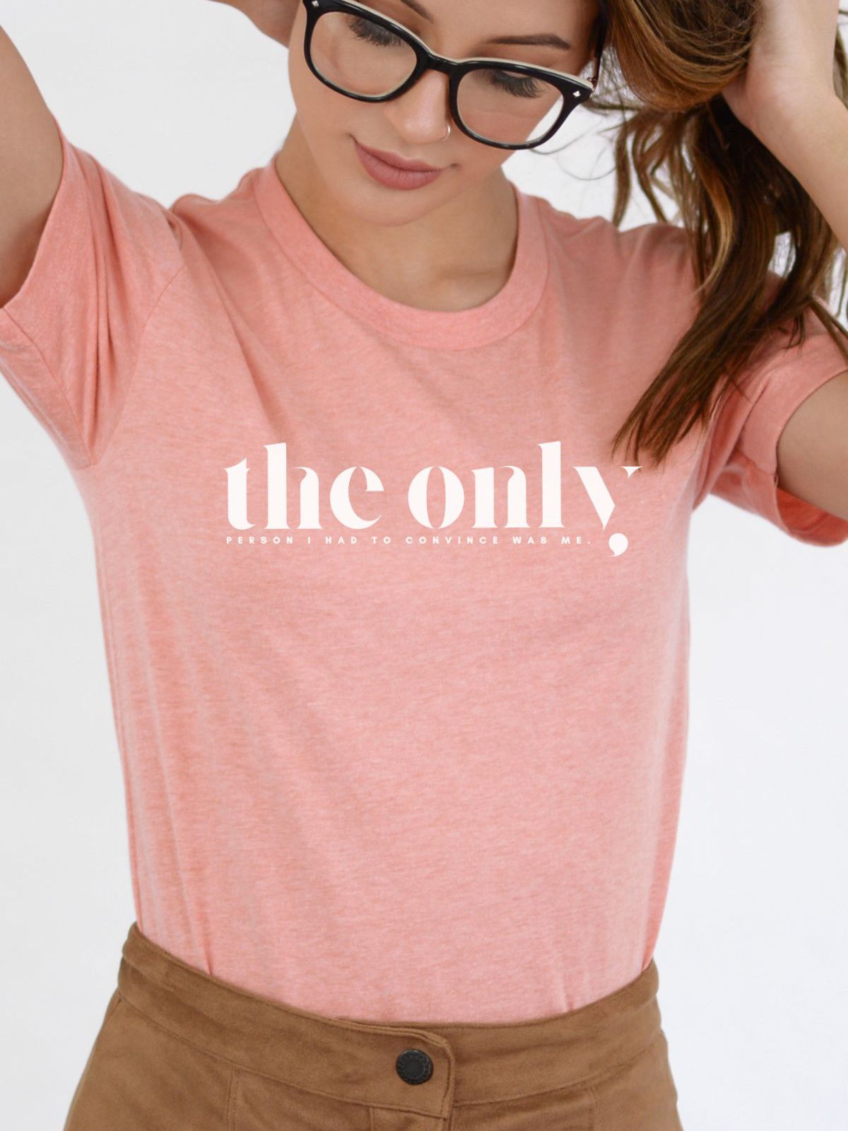 woman wearing pink t-shirt with the only text