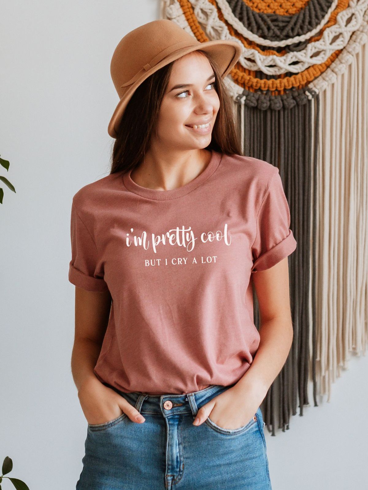 woman wearing pink t-shirt with I'm pretty cool but I cry a lot text