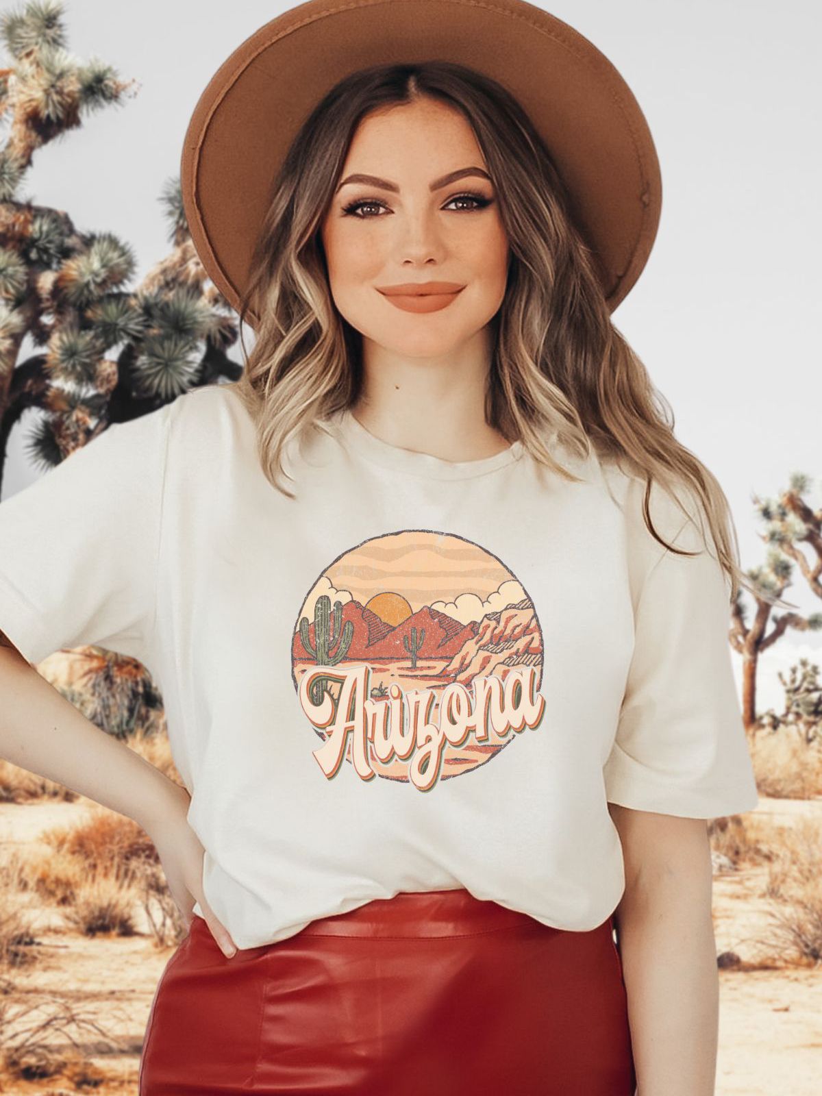 Woman wearing Arizona t-shirt with desert design