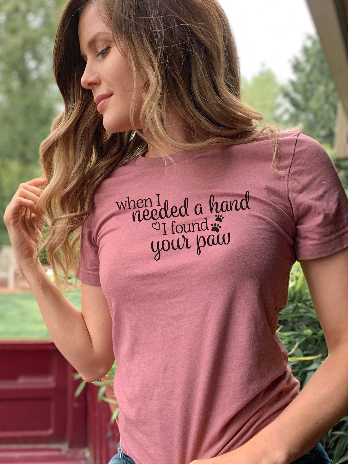 woman wearing a t-shirt with when I needed a hand I found your paw text