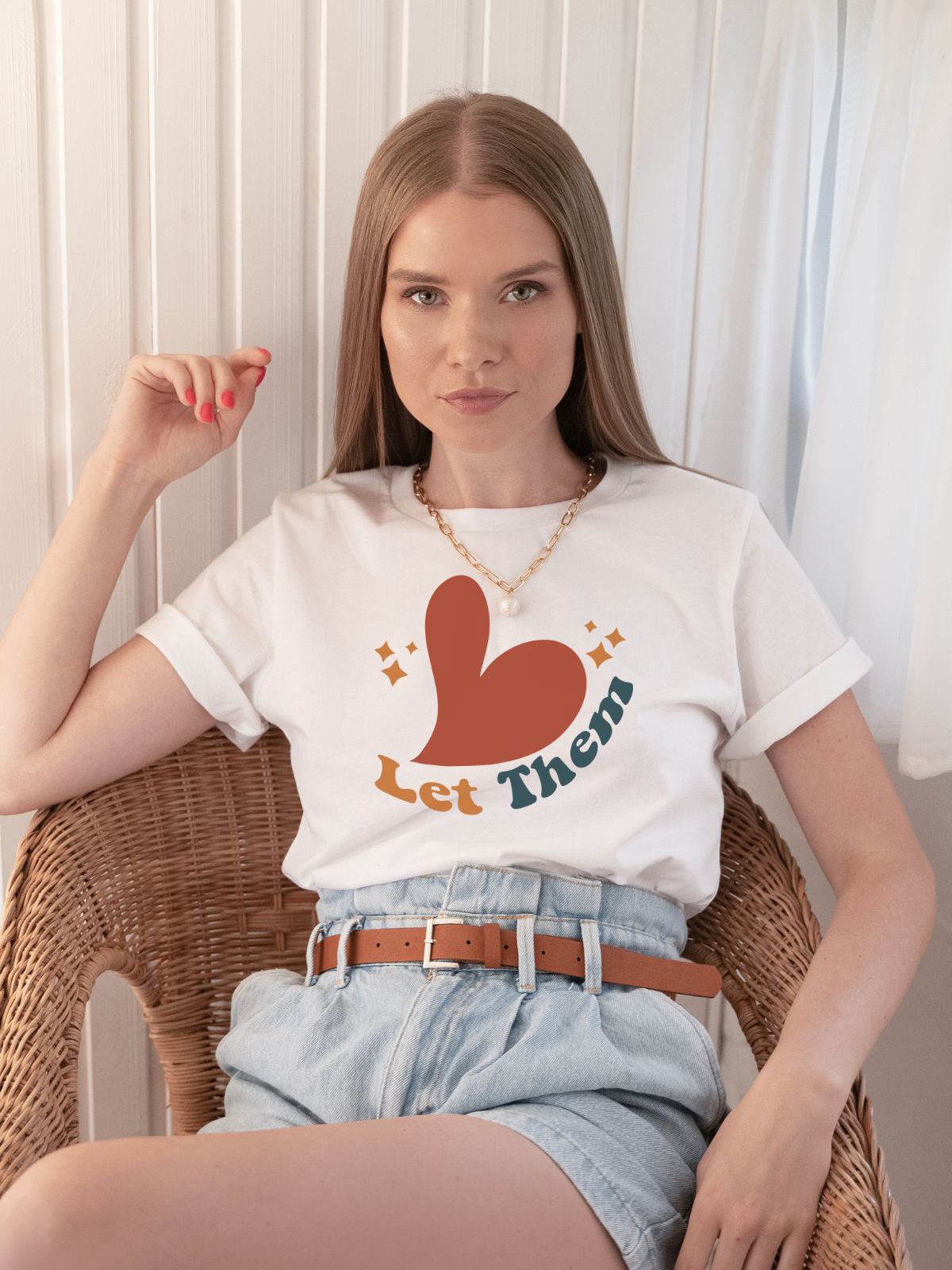 woman wearing let them heart design t-shirt