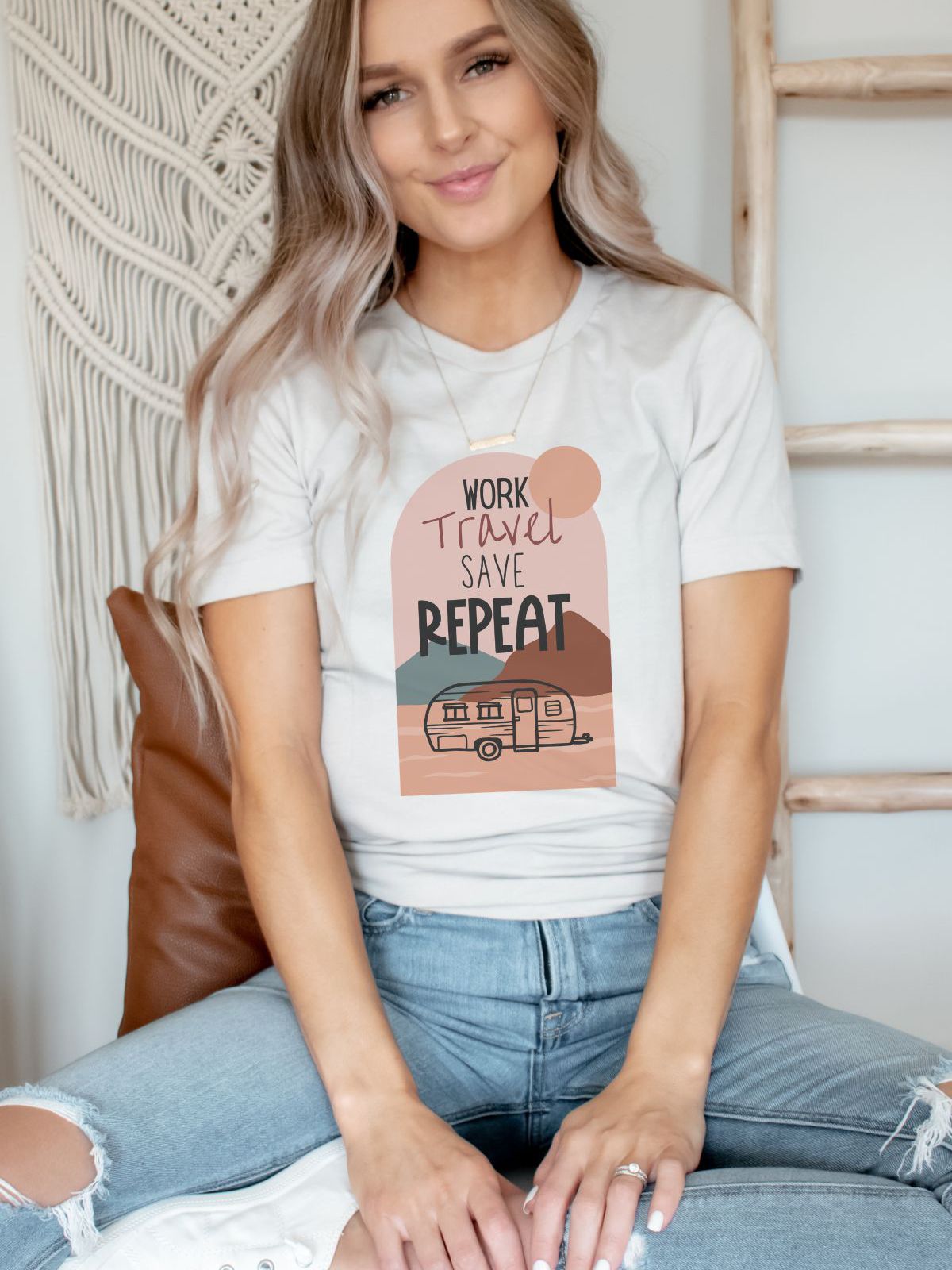 woman wearing travel themed t-shirt with camper design