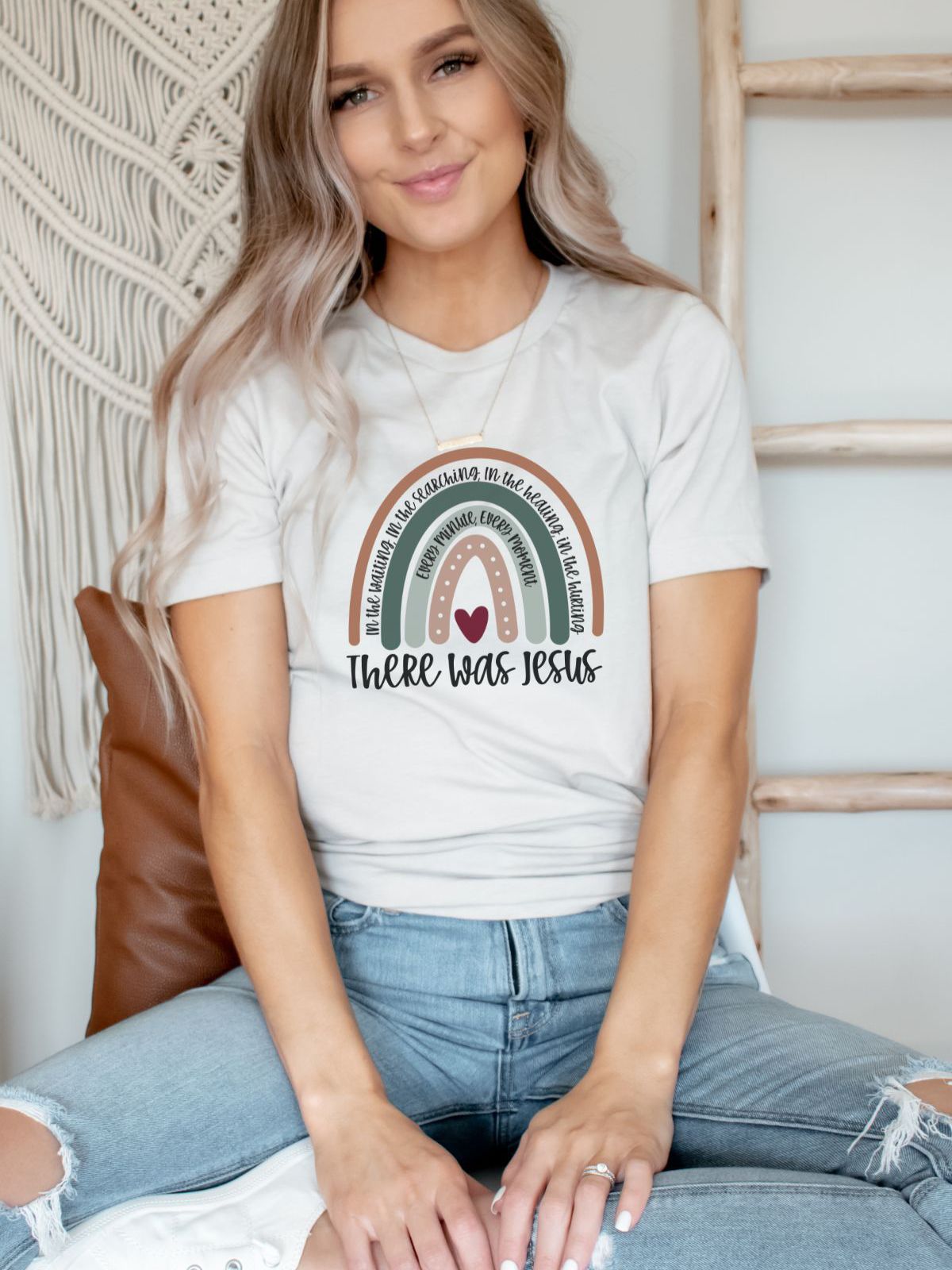 Woman wearing There Was Jesus rainbow t-shirt