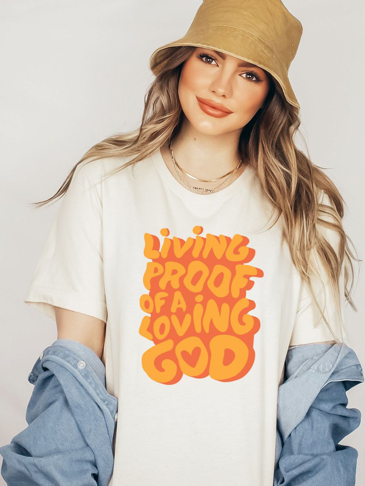 Woman wearing Living Proof of a Loving God t-shirt