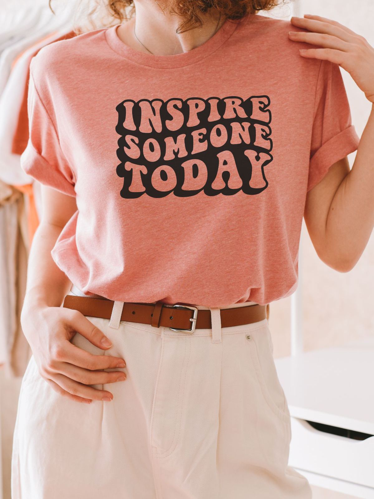 Person wearing an Inspire Someone Today T-Shirt