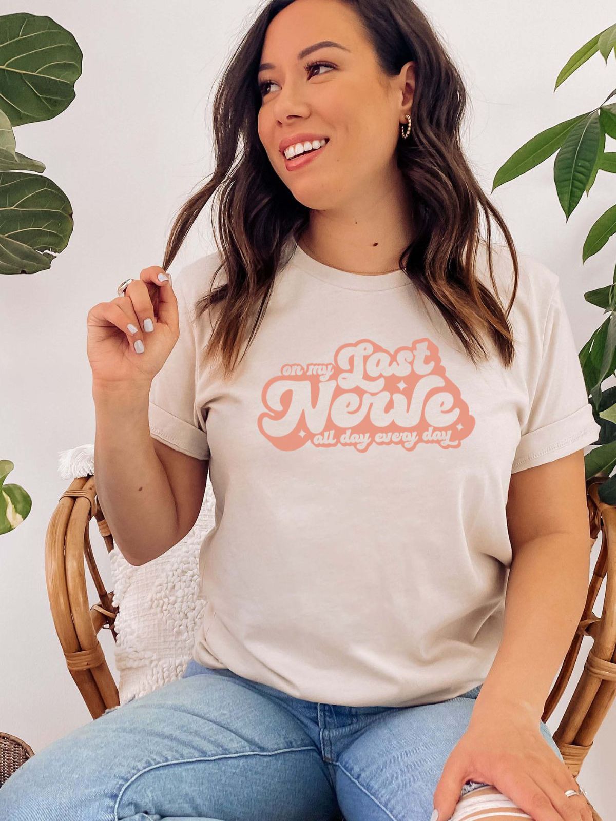 woman wearing a t-shirt with on my last nerve text