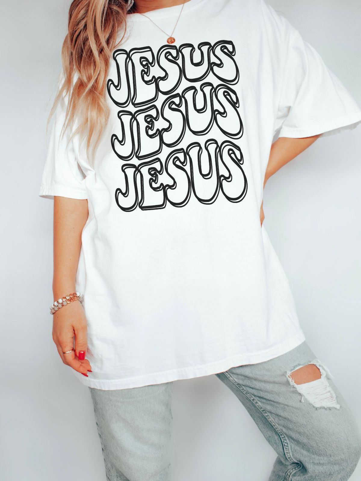 Woman wearing Jesus printed white t-shirt