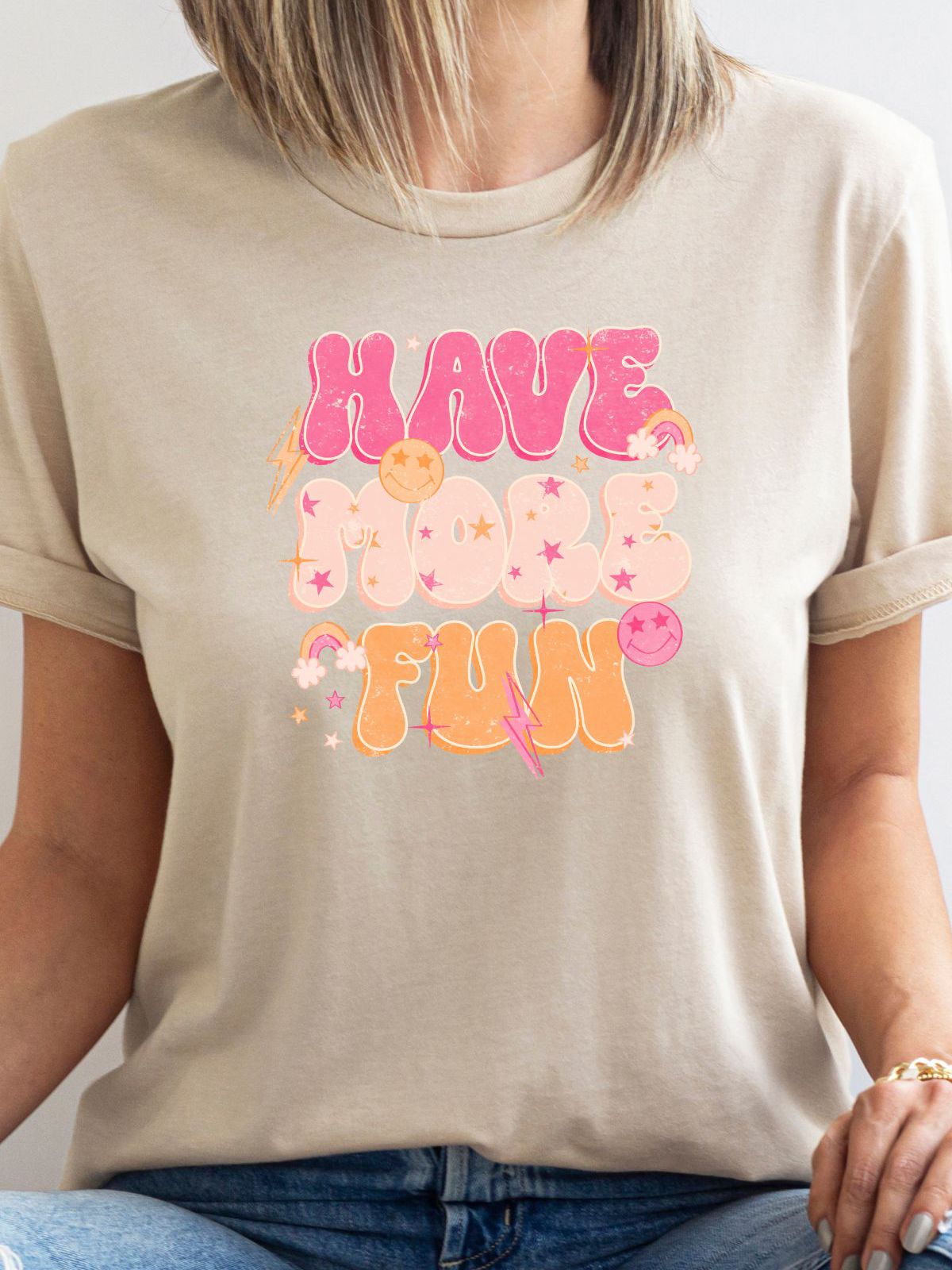 Beige t-shirt with Have More Fun colorful design
