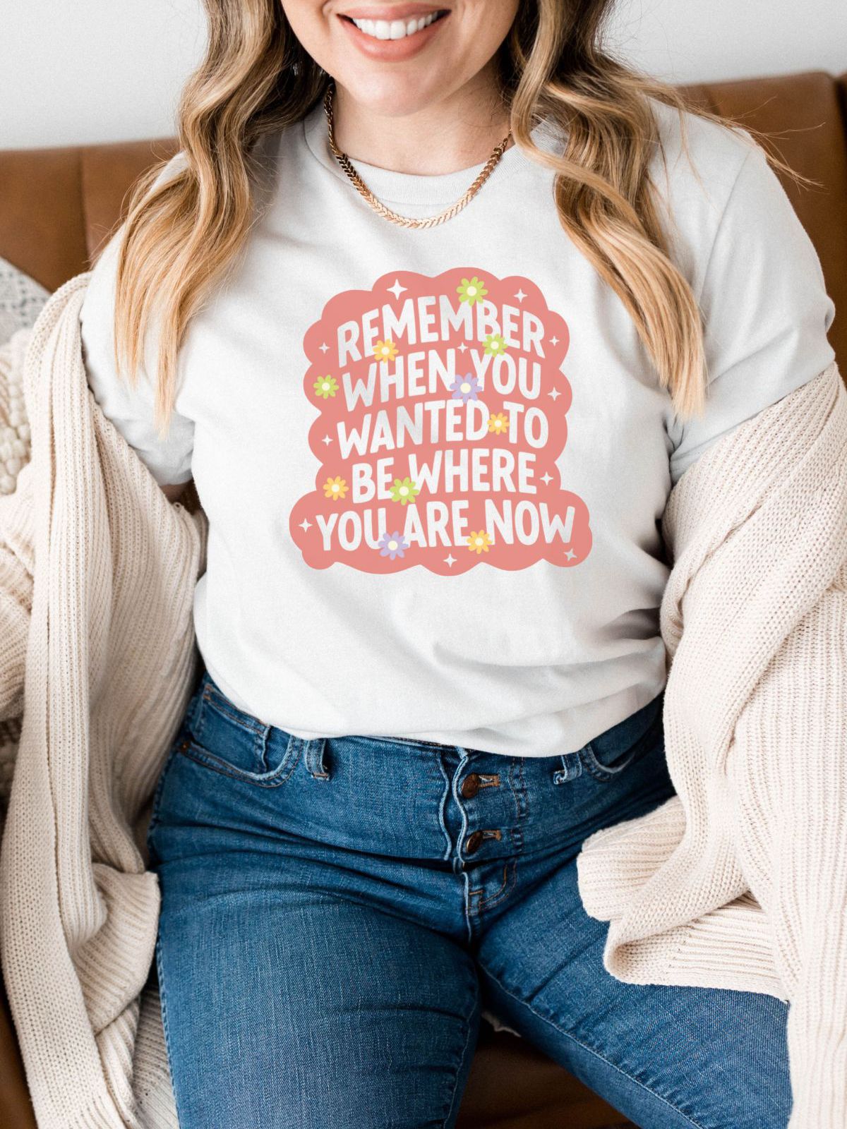 woman wearing a t-shirt with motivational text