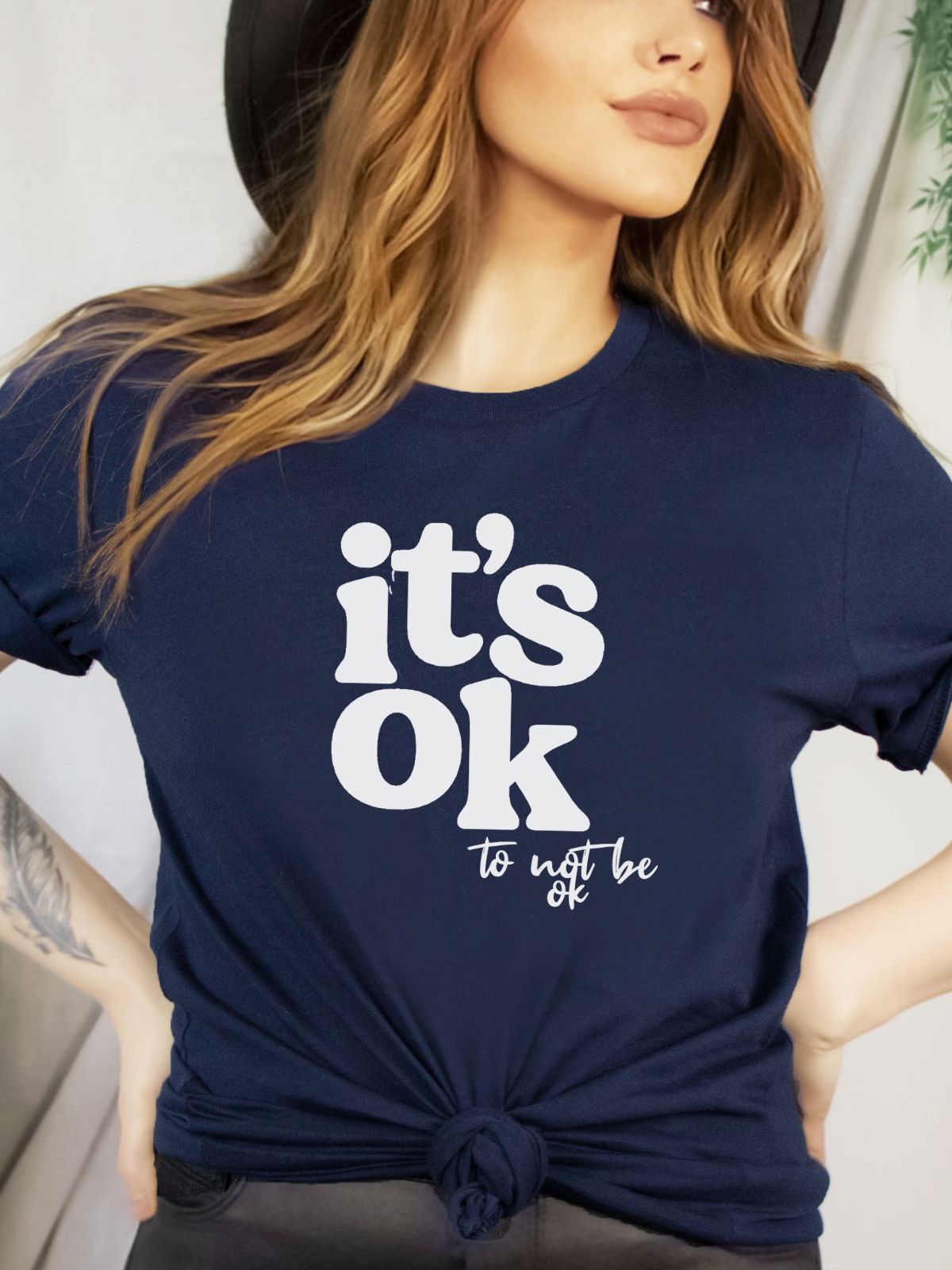 Women's navy t-shirt with It's OK to not be OK text design