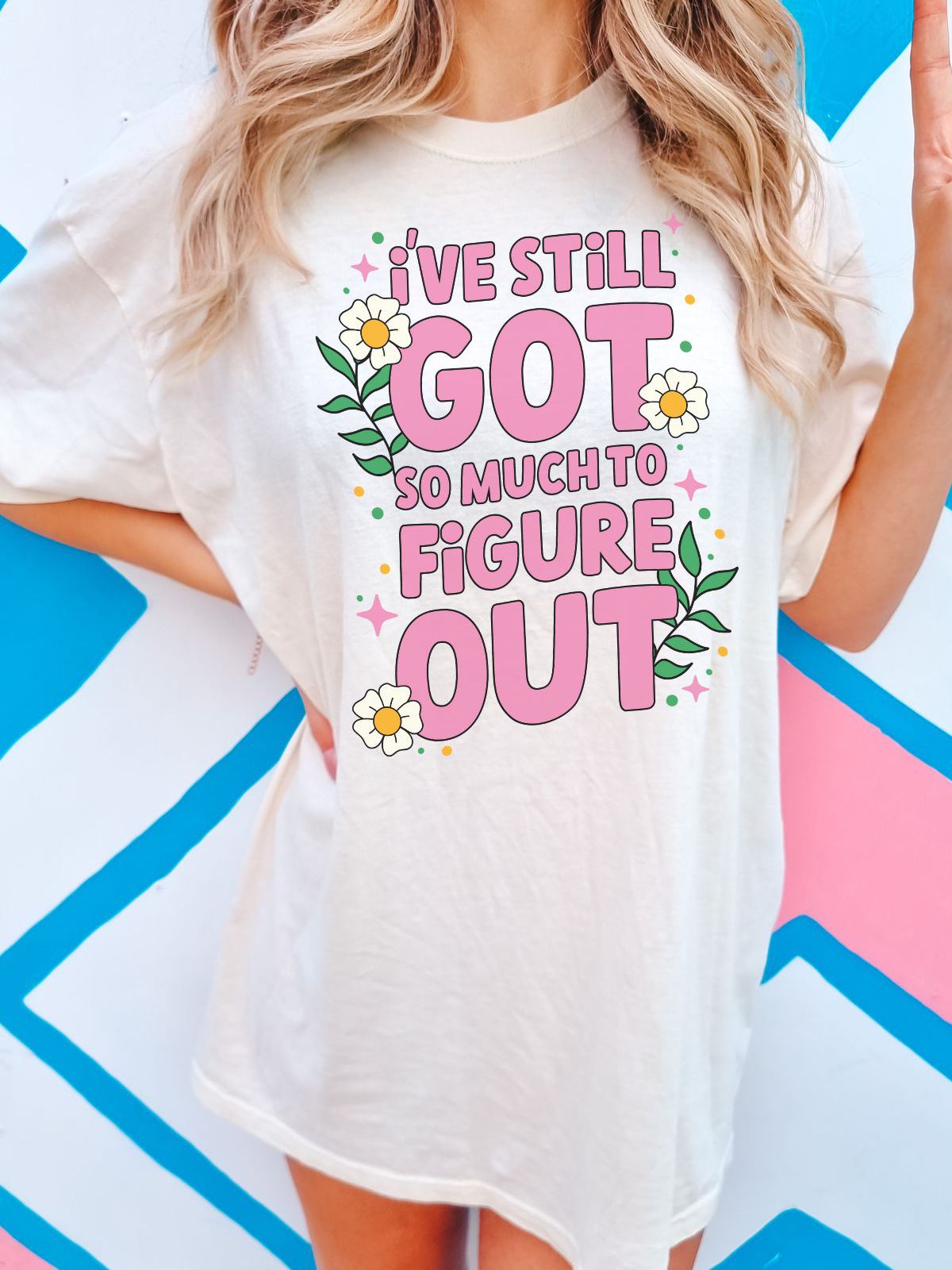 T-shirt with floral design and text I've Still Got So Much To Figure Out