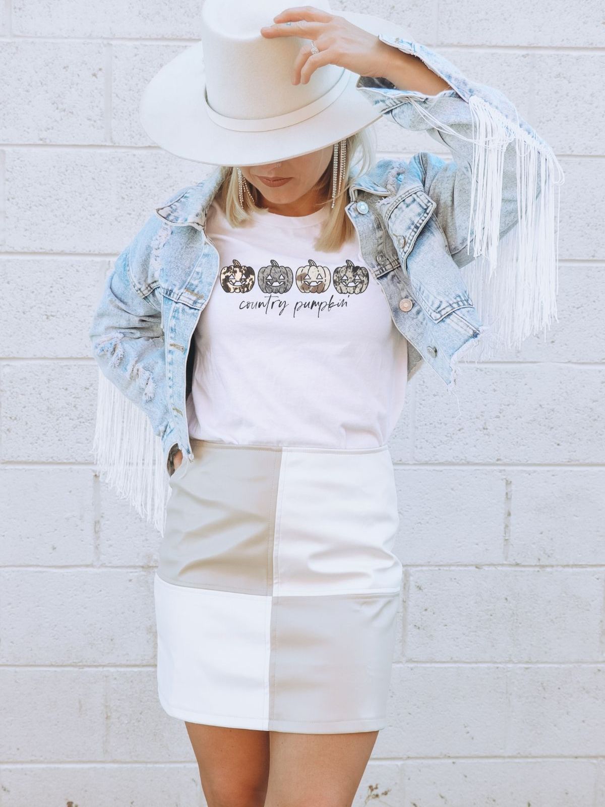 woman wearing t-shirt with country pumpkin design