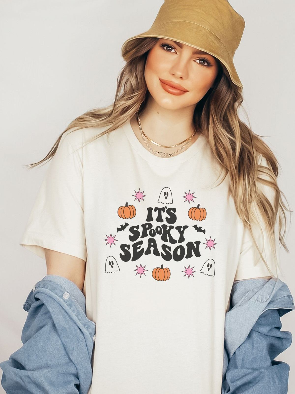 woman wearing spooky season halloween t-shirt