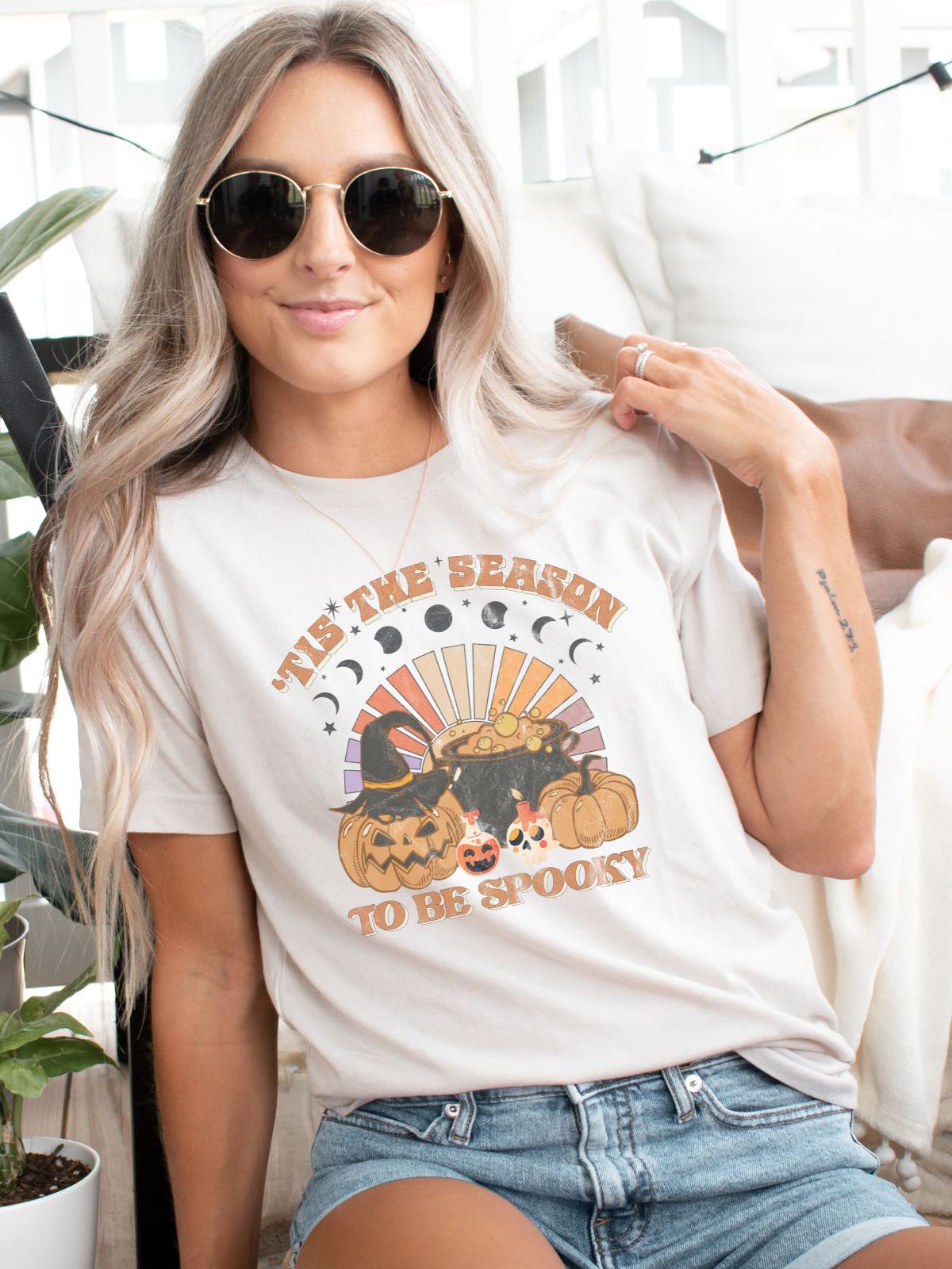 woman wearing spooky halloween theme t-shirt