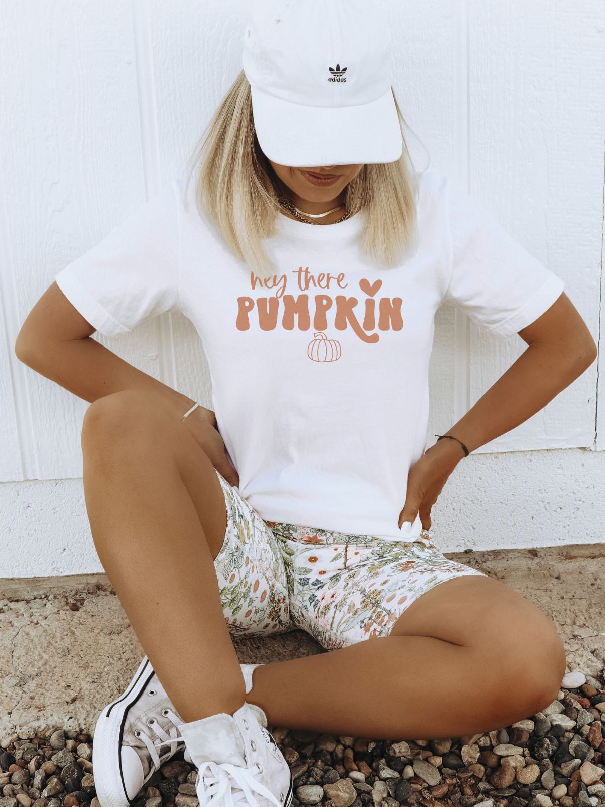 woman wearing hey there pumpkin t-shirt