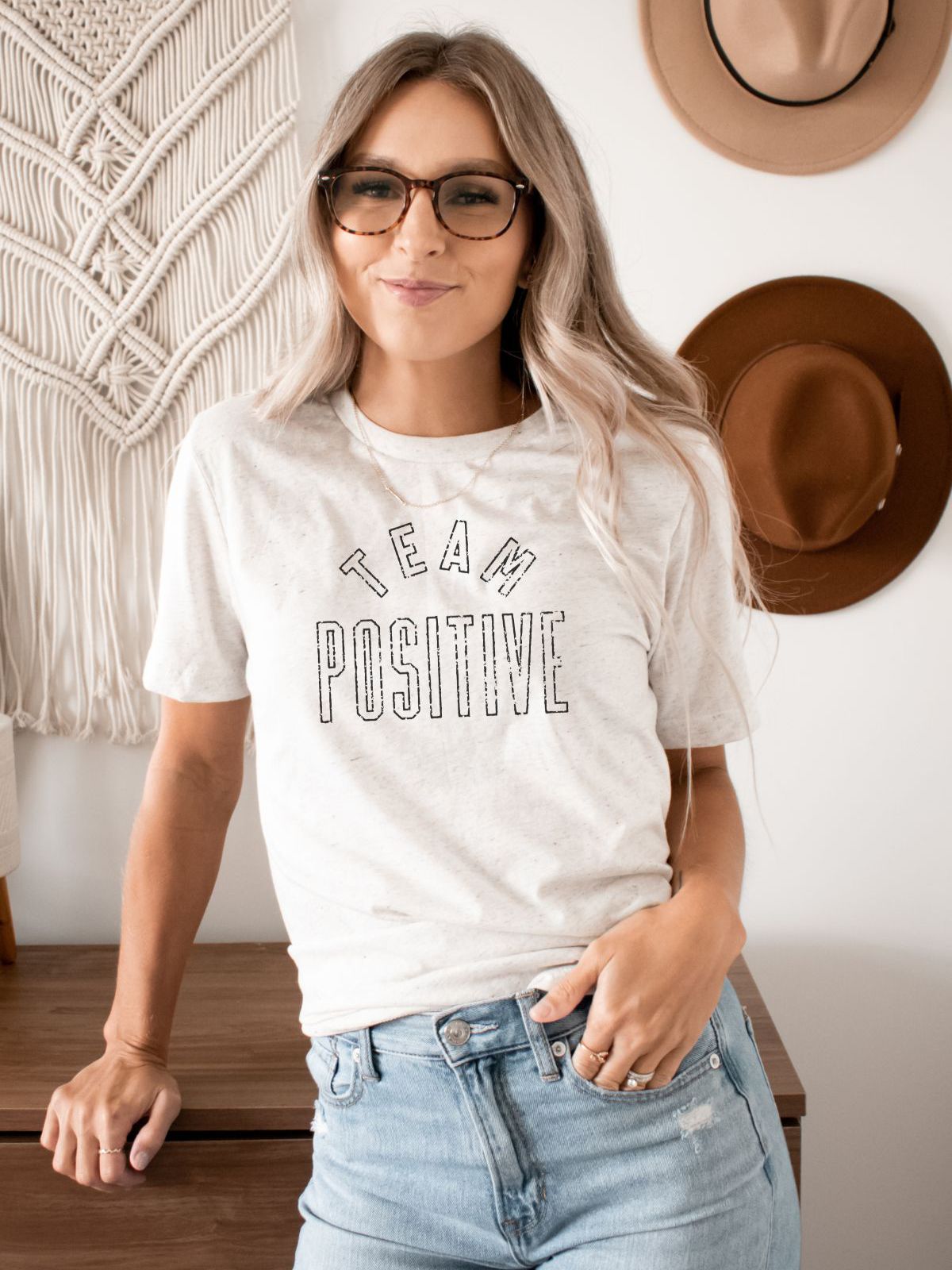 woman wearing team positive t-shirt