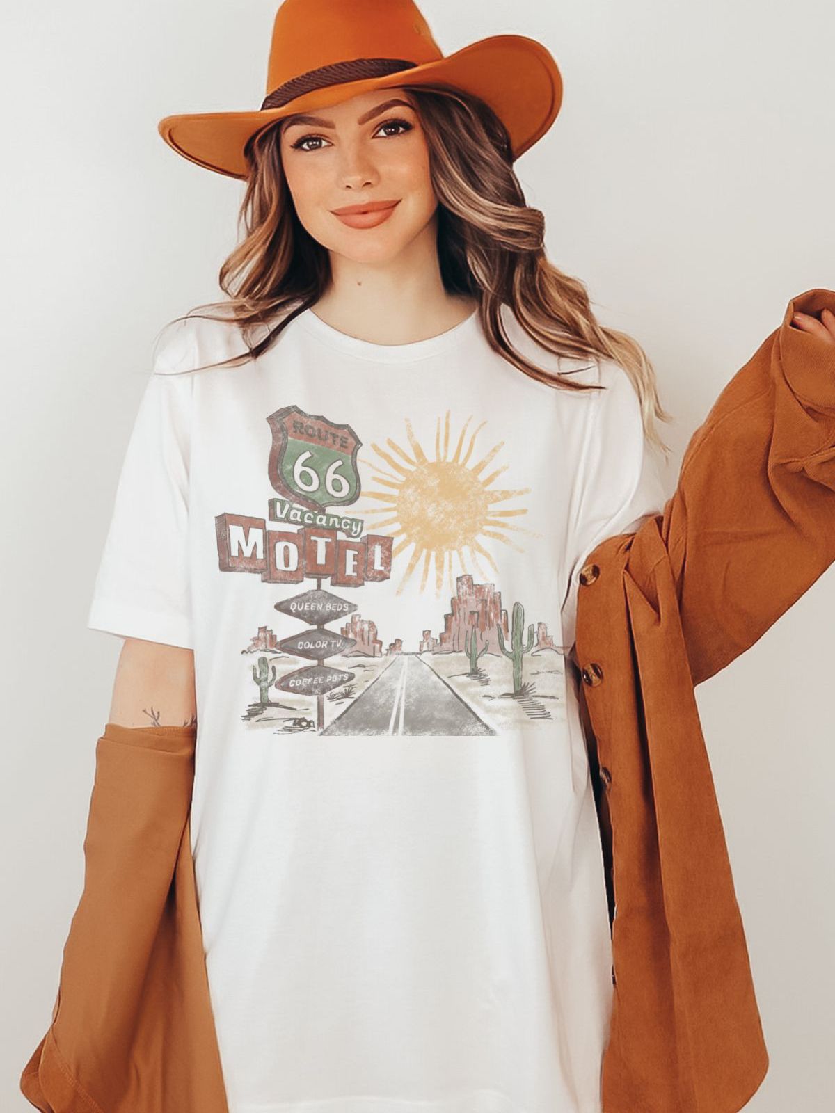woman wearing Route 66 graphic t-shirt with desert scene