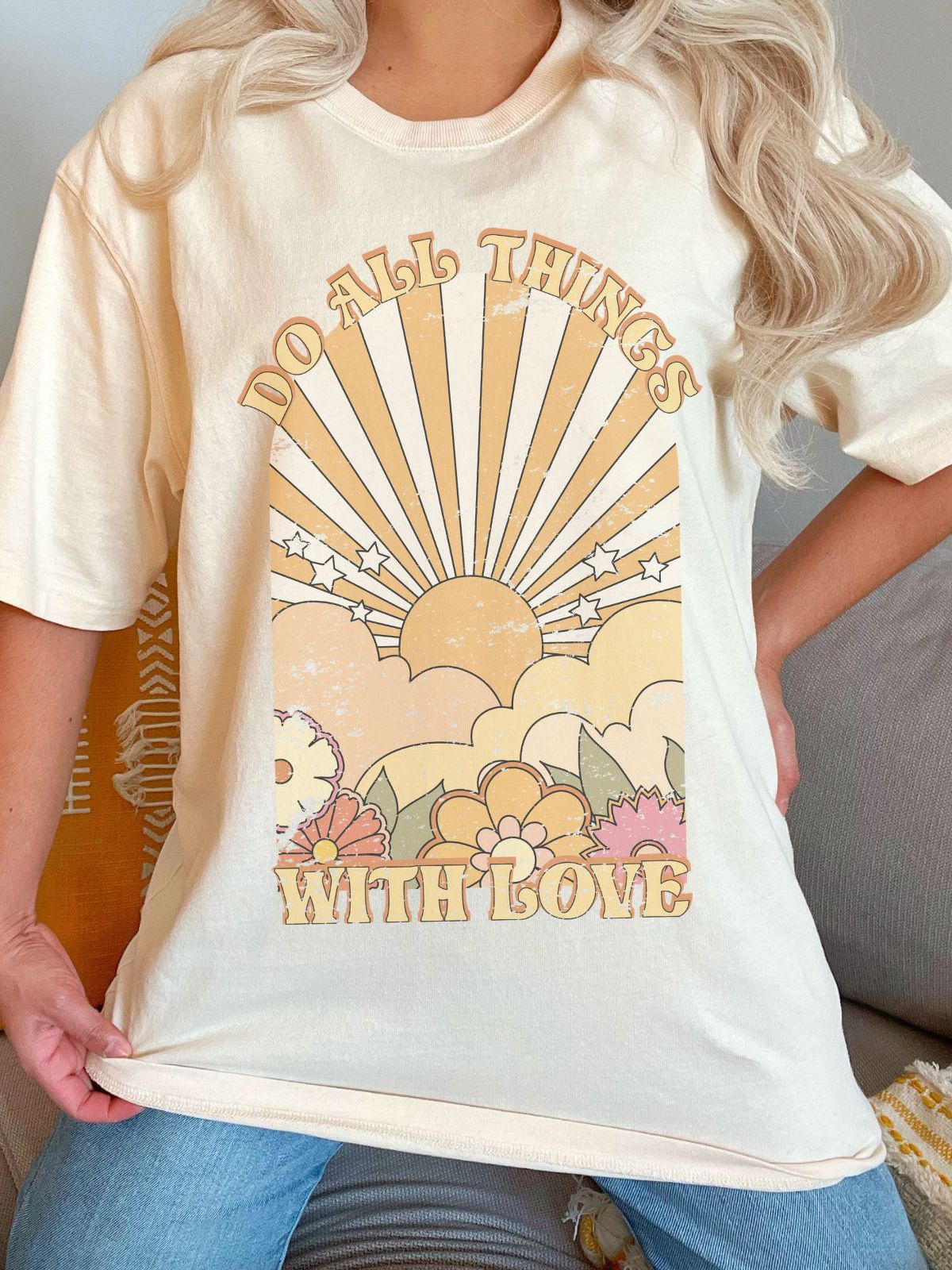 vintage style t-shirt with do all things with love text and sunburst design