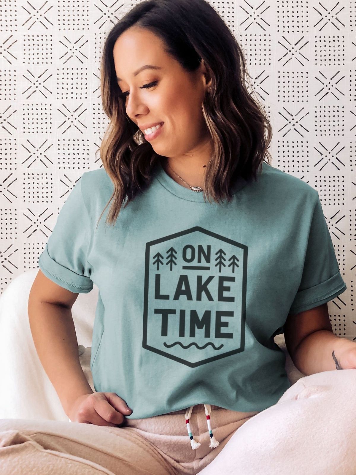 woman wearing on lake time t-shirt