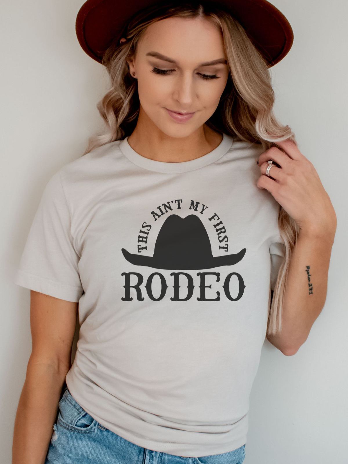 woman wearing rodeo themed t-shirt