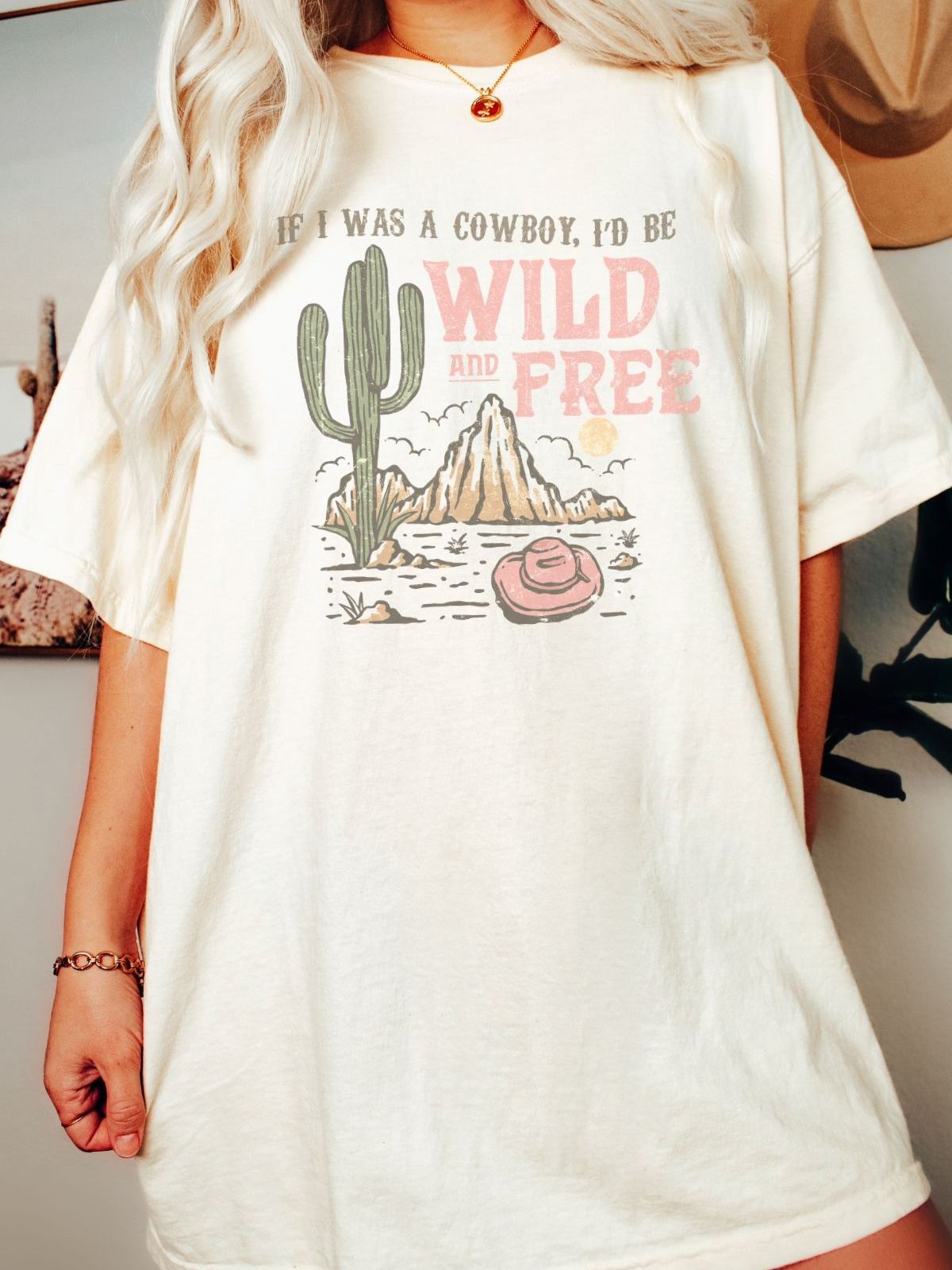 Graphic t-shirt with cowboy hat and cactus design