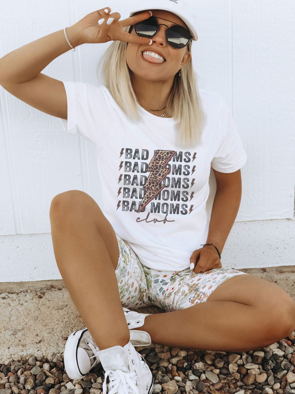 woman wearing a bad moms club t-shirt