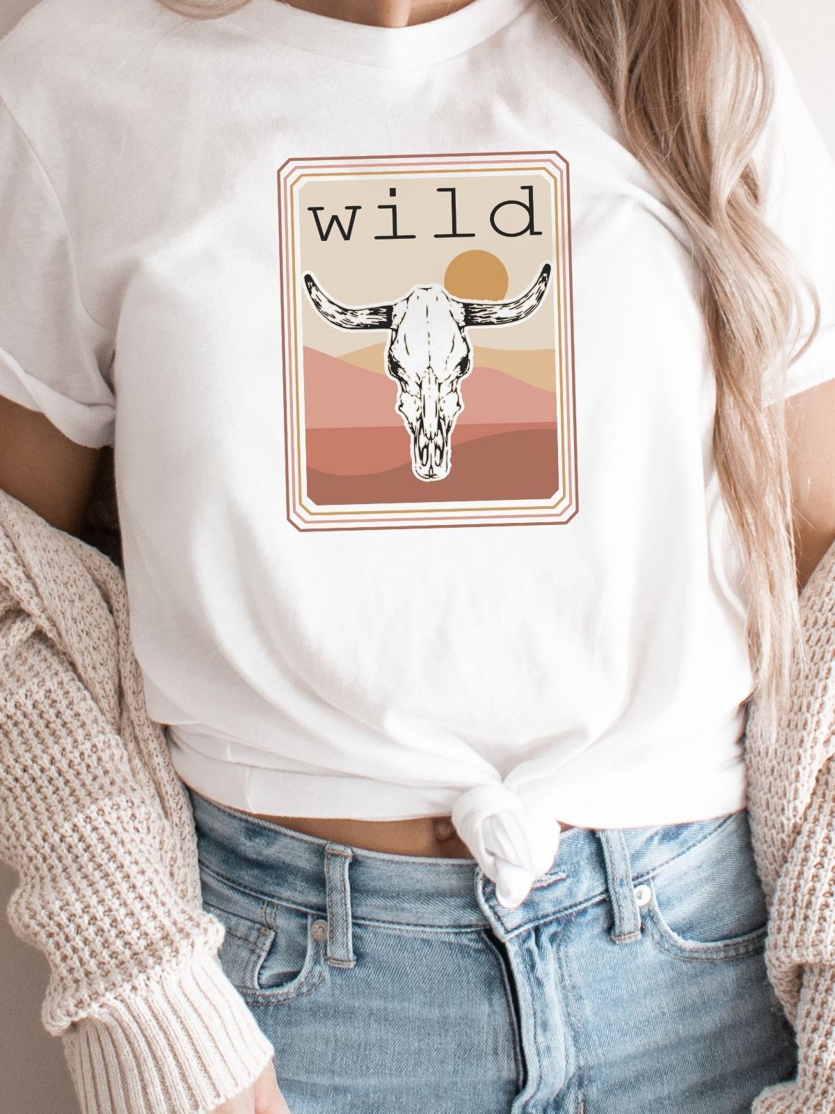 Graphic tee with wild text and bull skull design