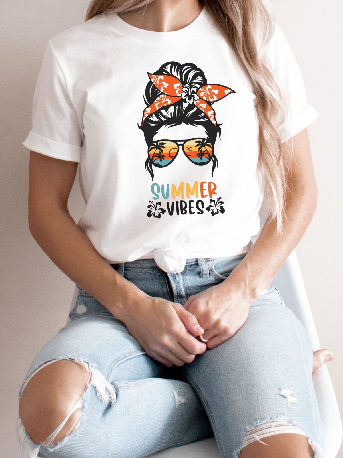 woman wearing Summer Vibes t-shirt with sunglasses design