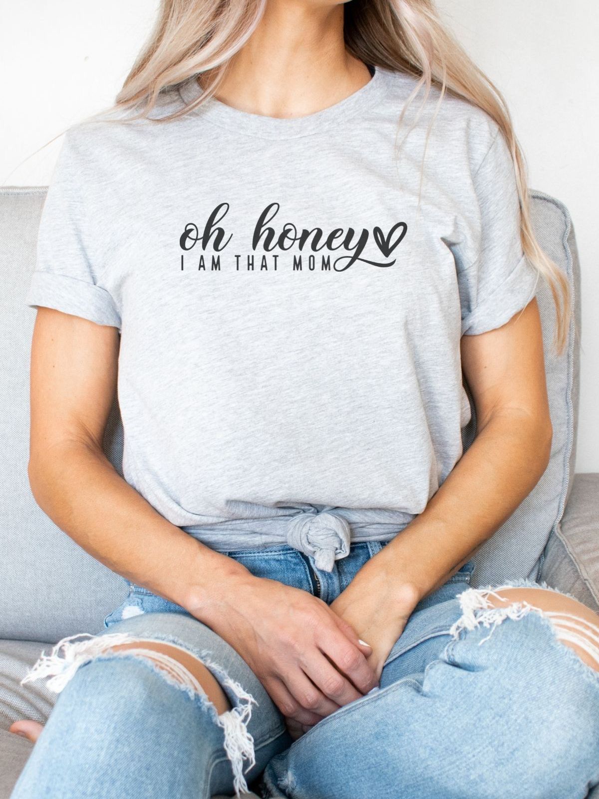 woman wearing gray t-shirt with oh honey i am that mom print