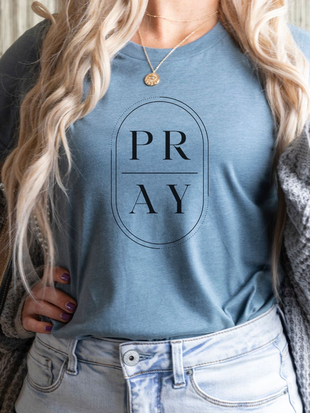Blue t-shirt with PRAY text design