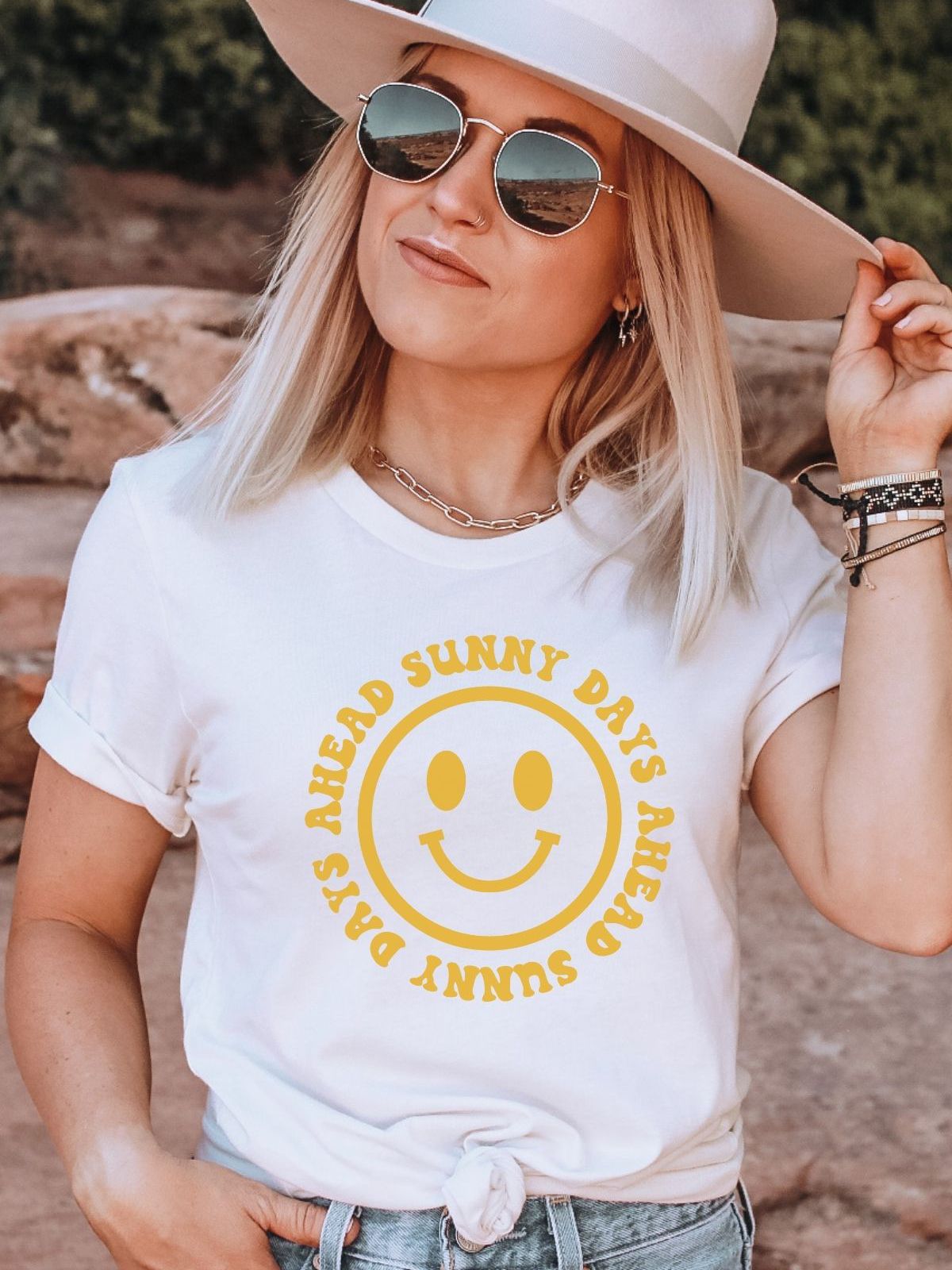 woman wearing sunny days ahead t-shirt