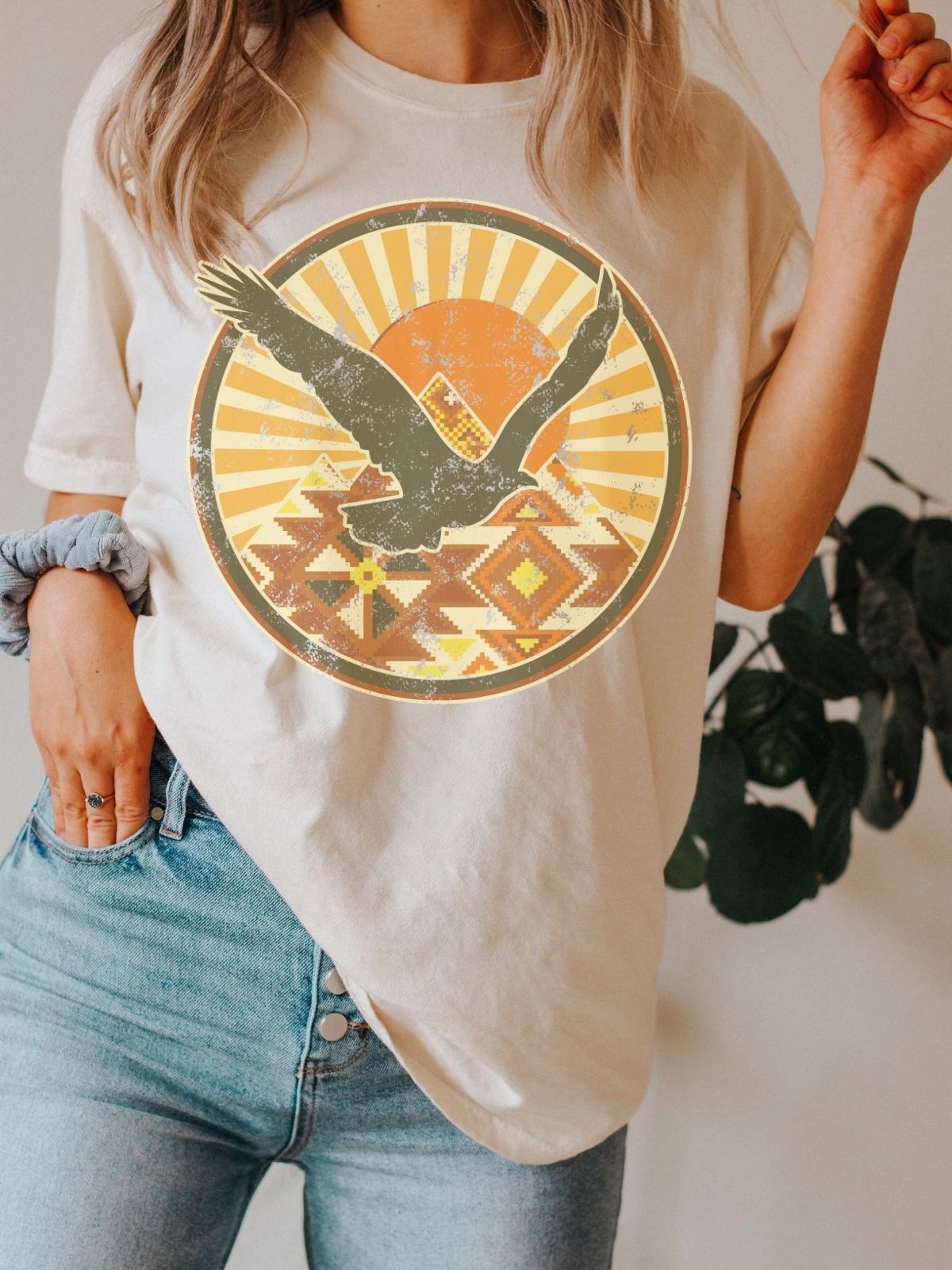 woman wearing a t-shirt with eagle design