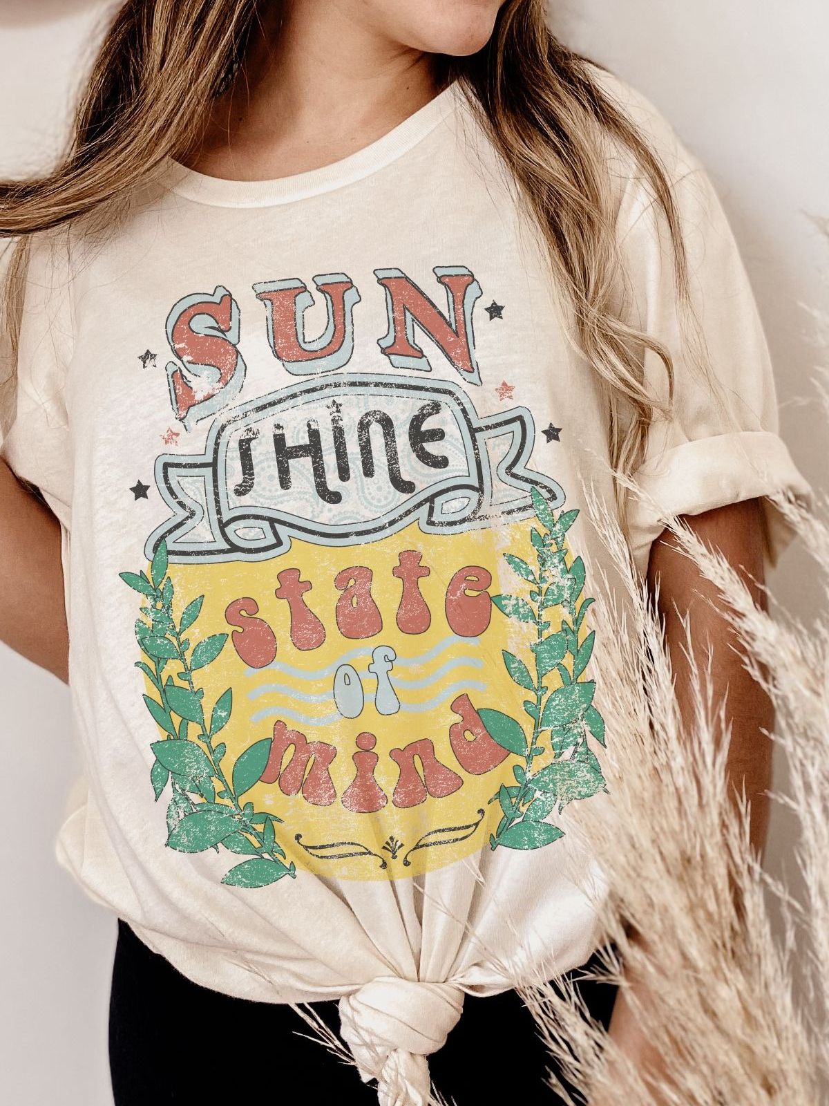 woman wearing a sunshine state of mind t-shirt