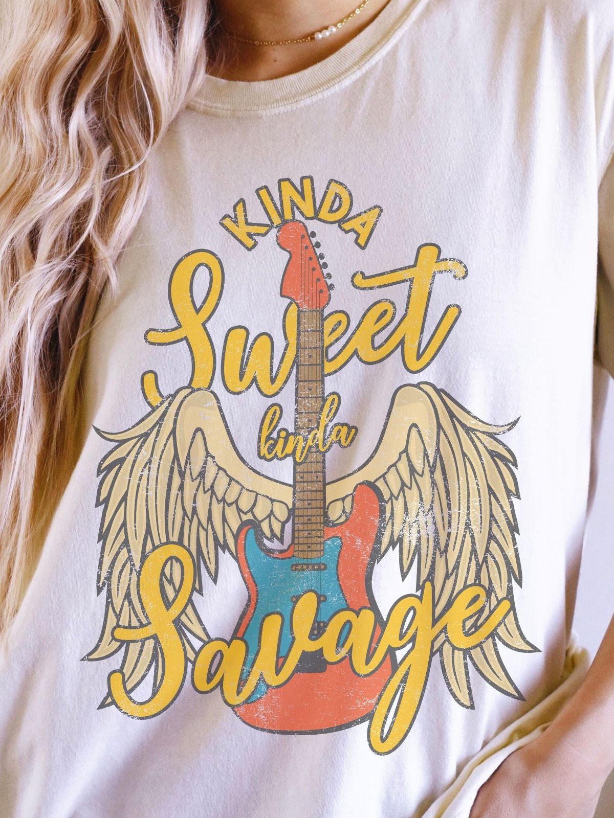 Women's t-shirt with guitar wings and Kinda Sweet Kinda Savage text