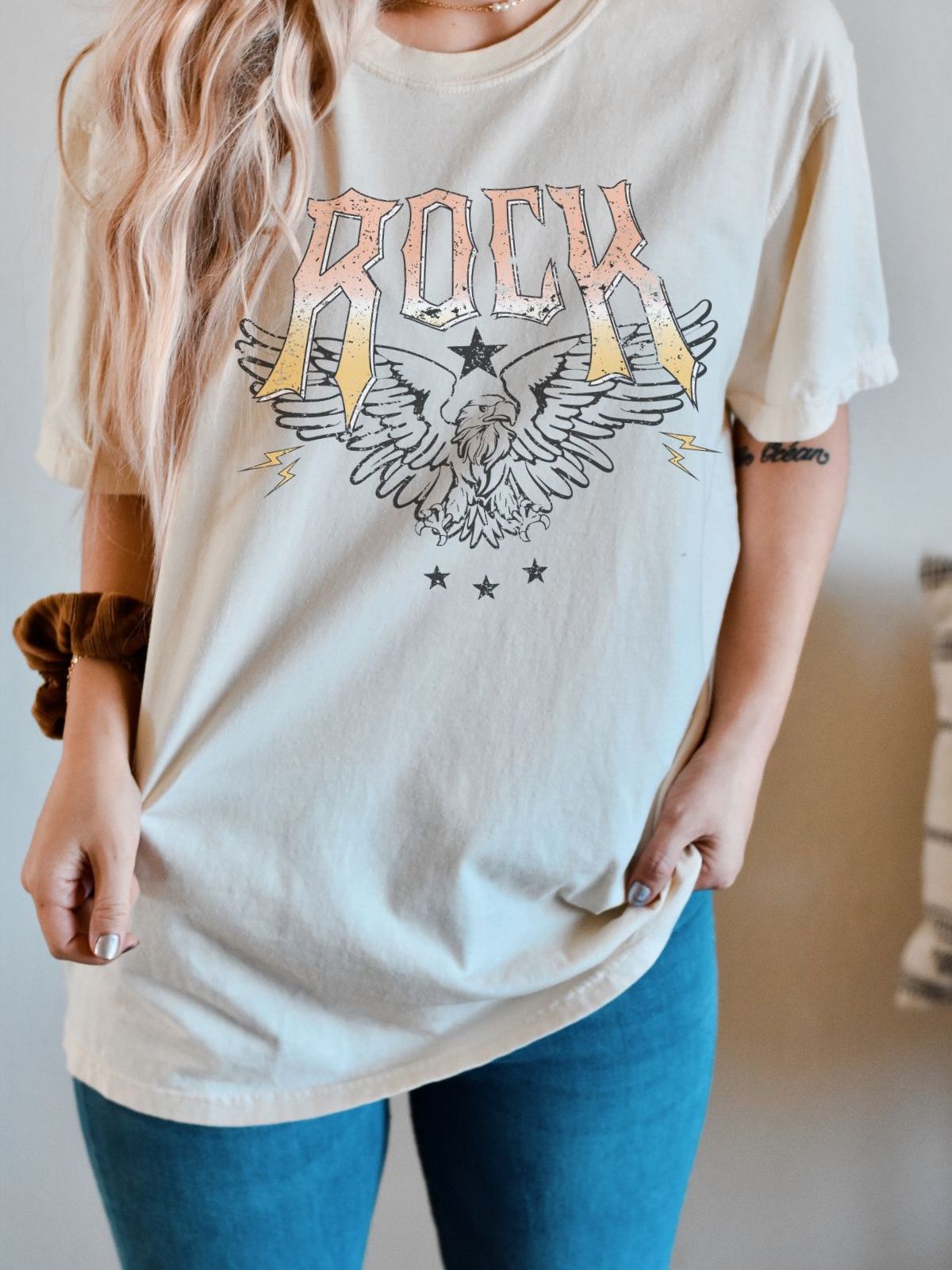 woman wearing rock music graphic t-shirt